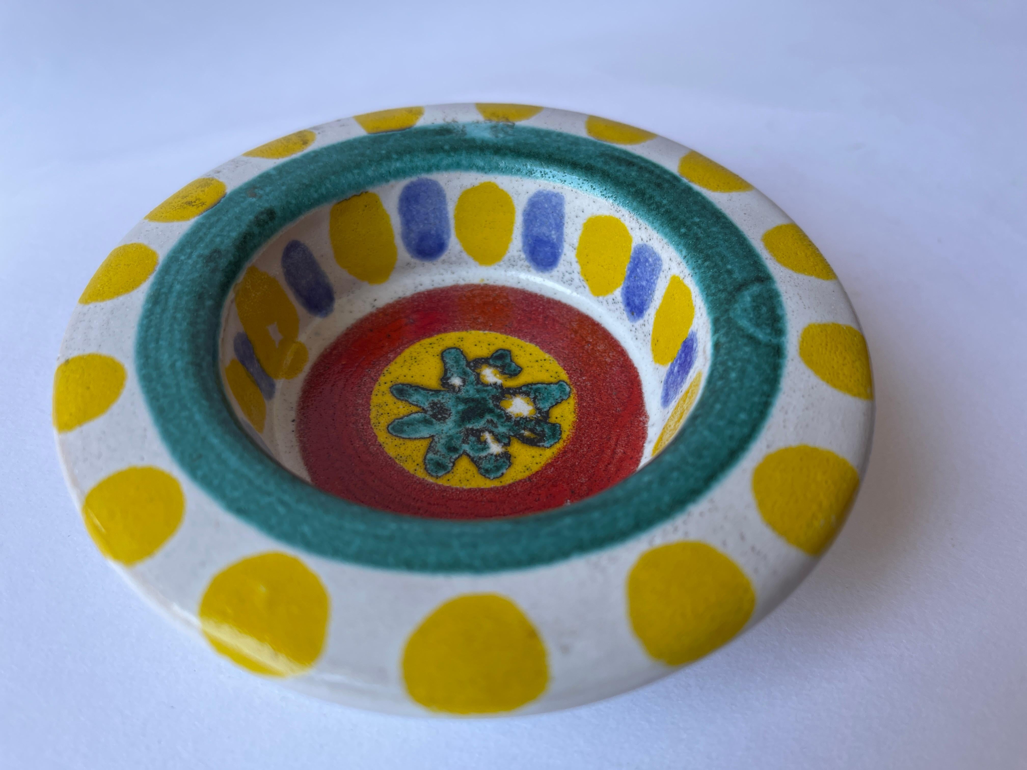 Italian 1960's hand painted colorful ceramic dish by Giovanni DeSimone, hand crafted in Italy. Signed on underside, DeSimone, Italy 60.