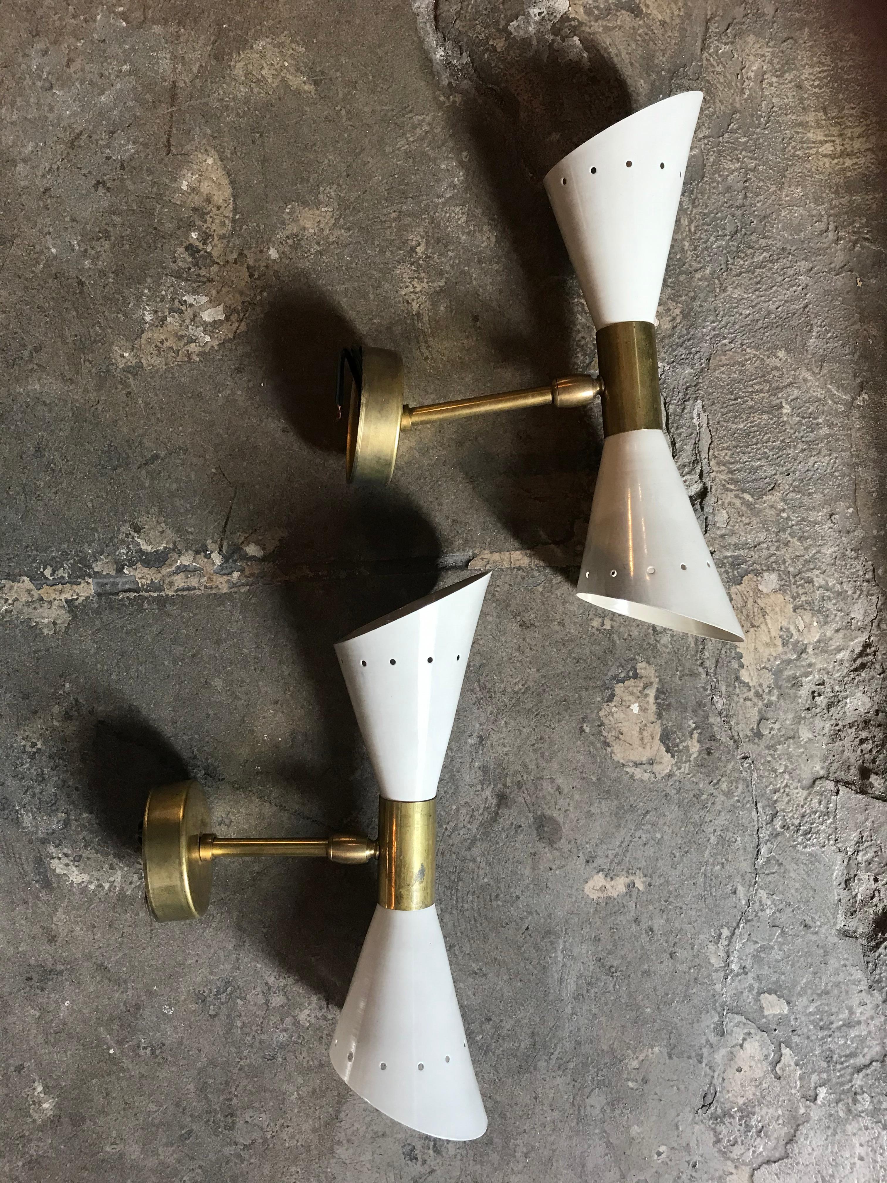 Italian 1960s pair of sconces lacquered metal and brass.