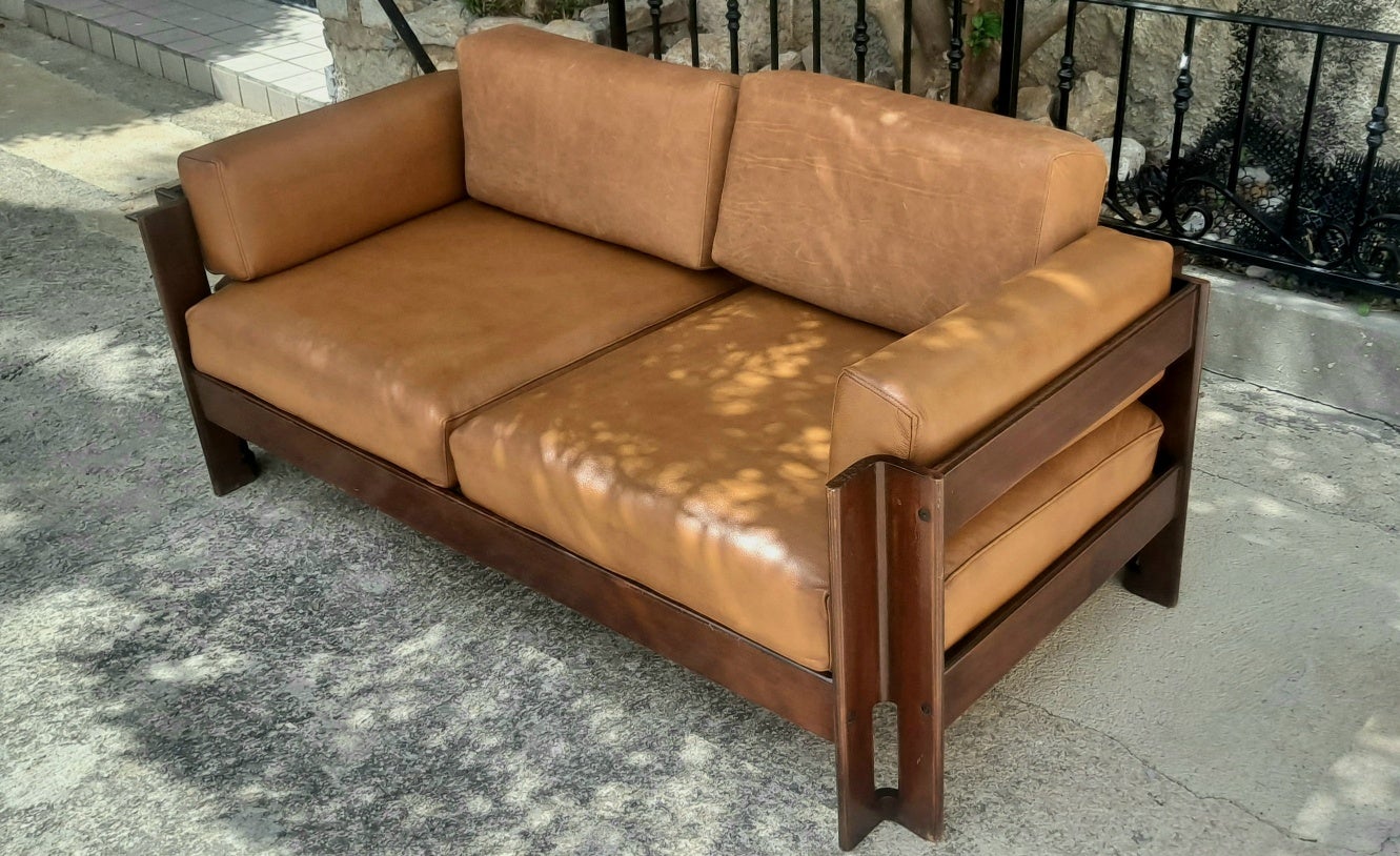  Settee by Sergio Asti  period 1962 and it is  new reupholstered in leather . 