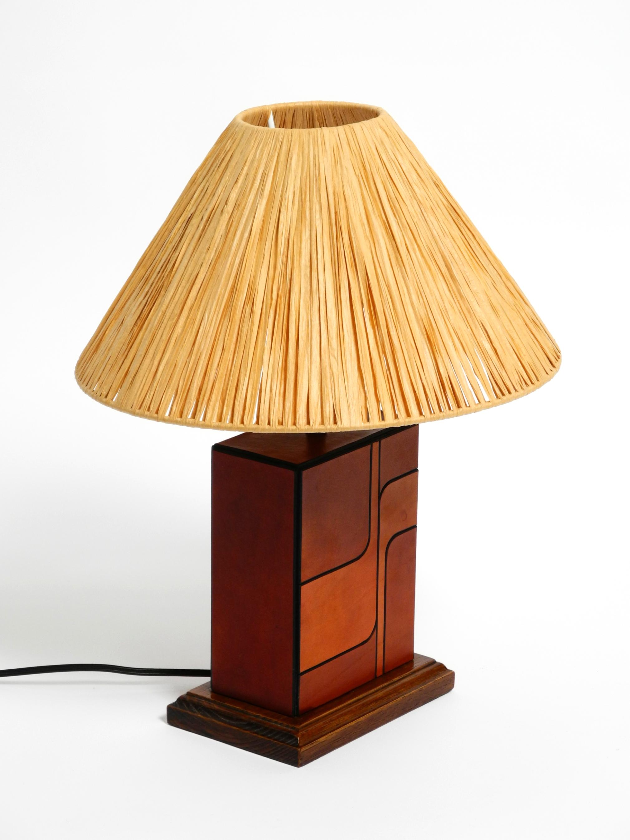 Mid-20th Century Italian 1960s table lamp made of wood and leather with paper straw lampshade For Sale