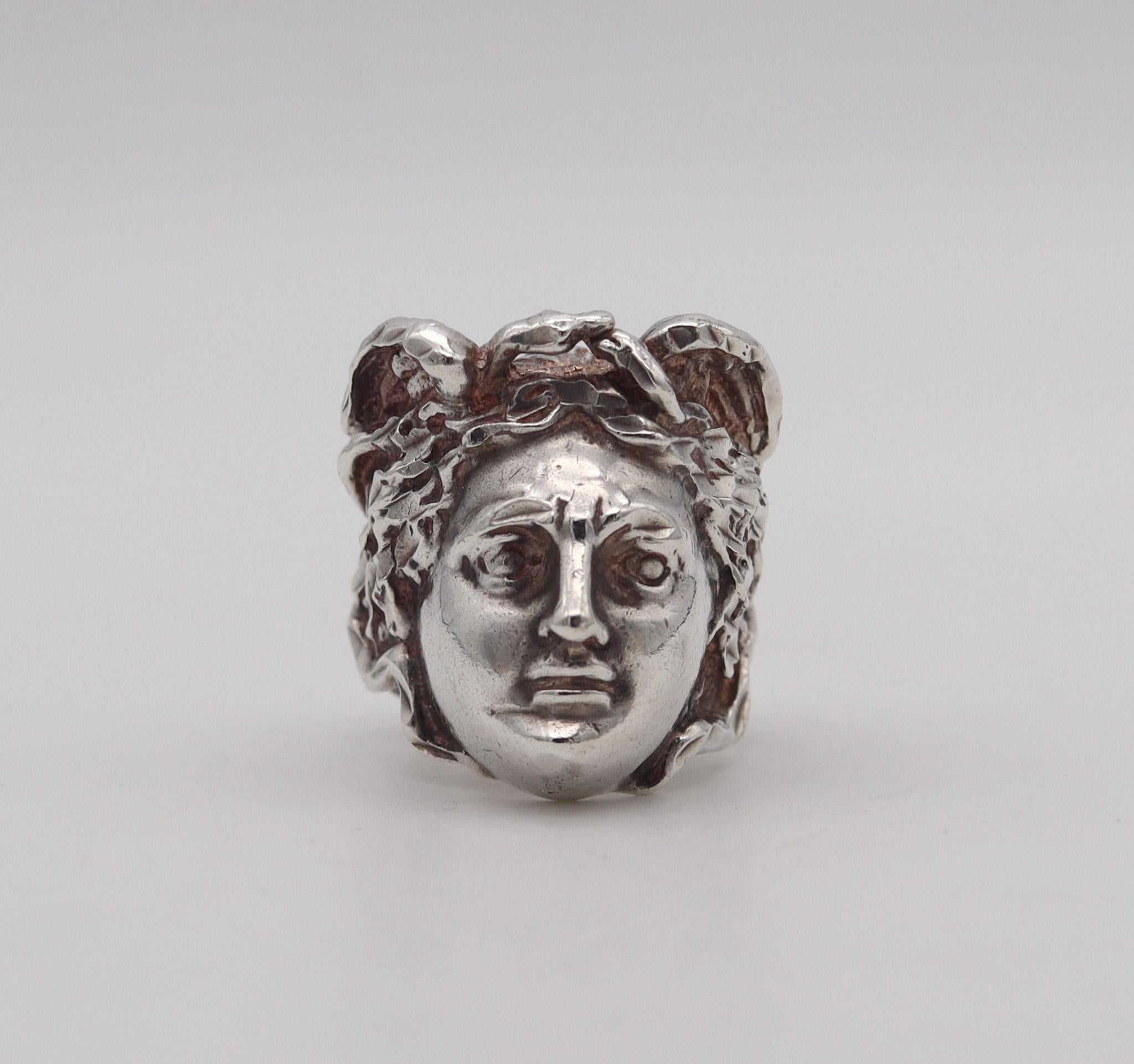 Ring with the portrait of Mercurius.

An extremely well detailed ring, created in Italy back in the 1970. The ring has been crafted in the baroque style with great high relief details in solid .925/.999 sterling silver with textured and polished