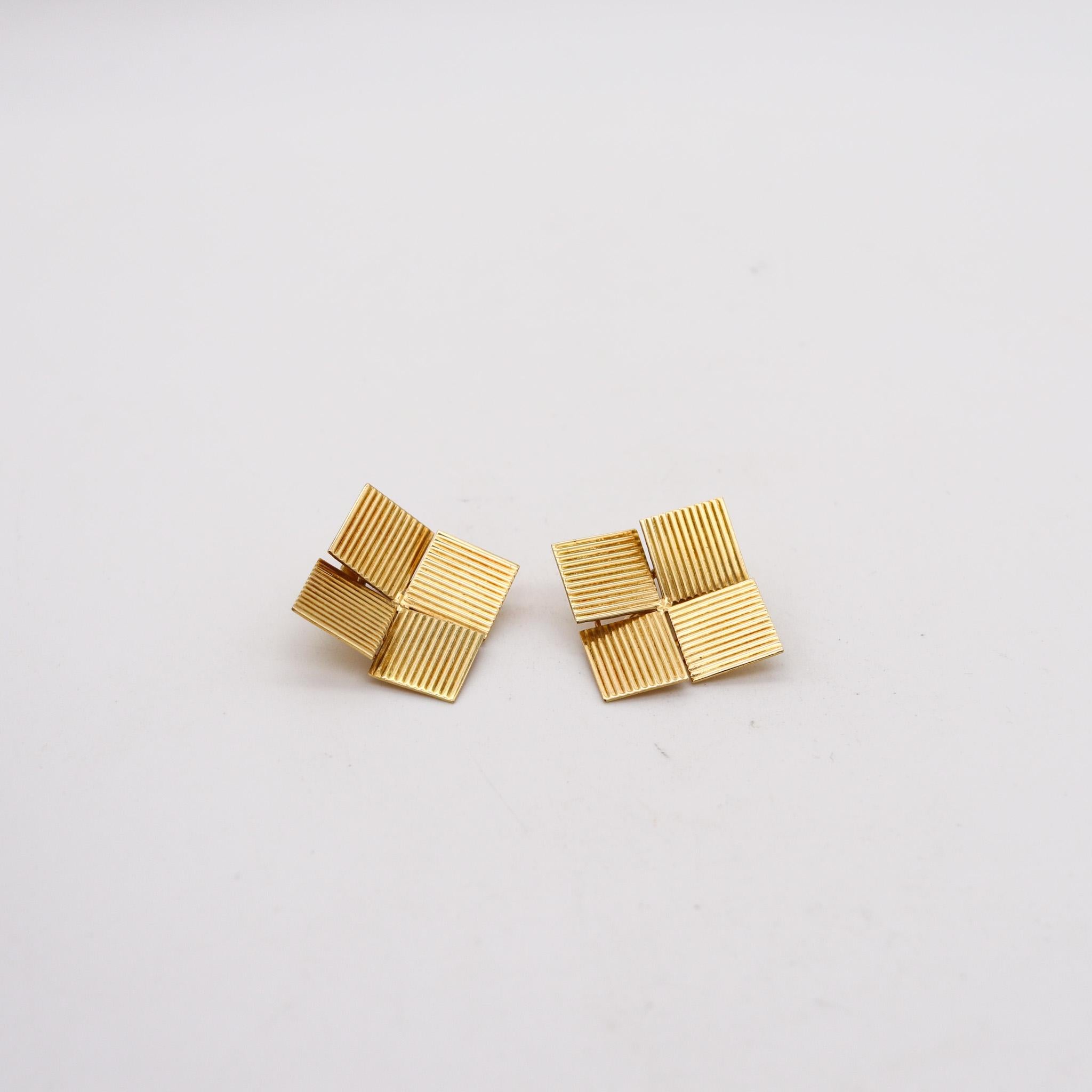 A modernist geometric squares earrings

A pair of geometric clips-on earrings, created in Italy back in the 1970. These earrings are very unusual and has been crafted with modernist patterns in solid yellow gold of 18 karats with high polished