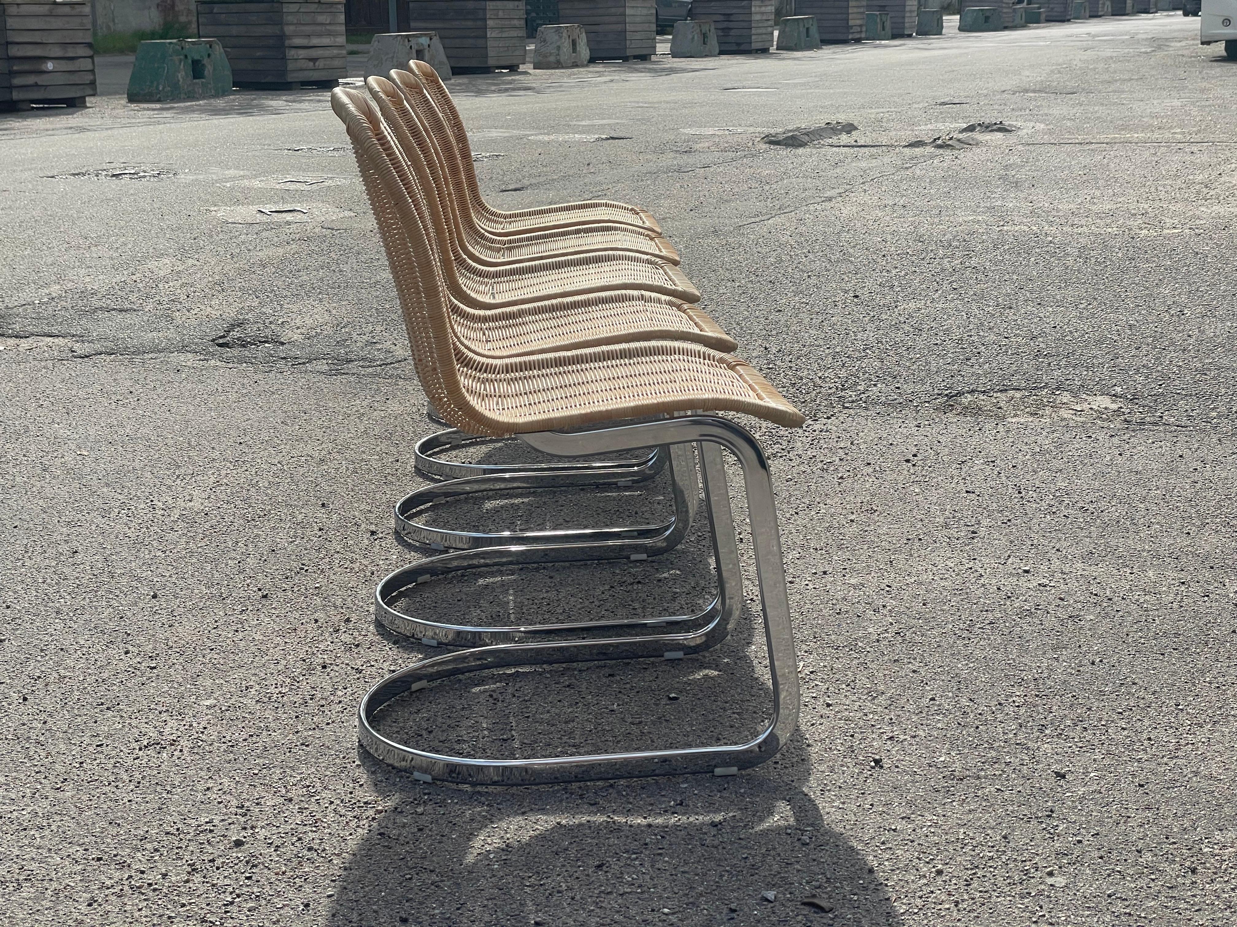 Chrome Italian 1970´s Cidue dinning chairs with chrome structure and wicker seating.