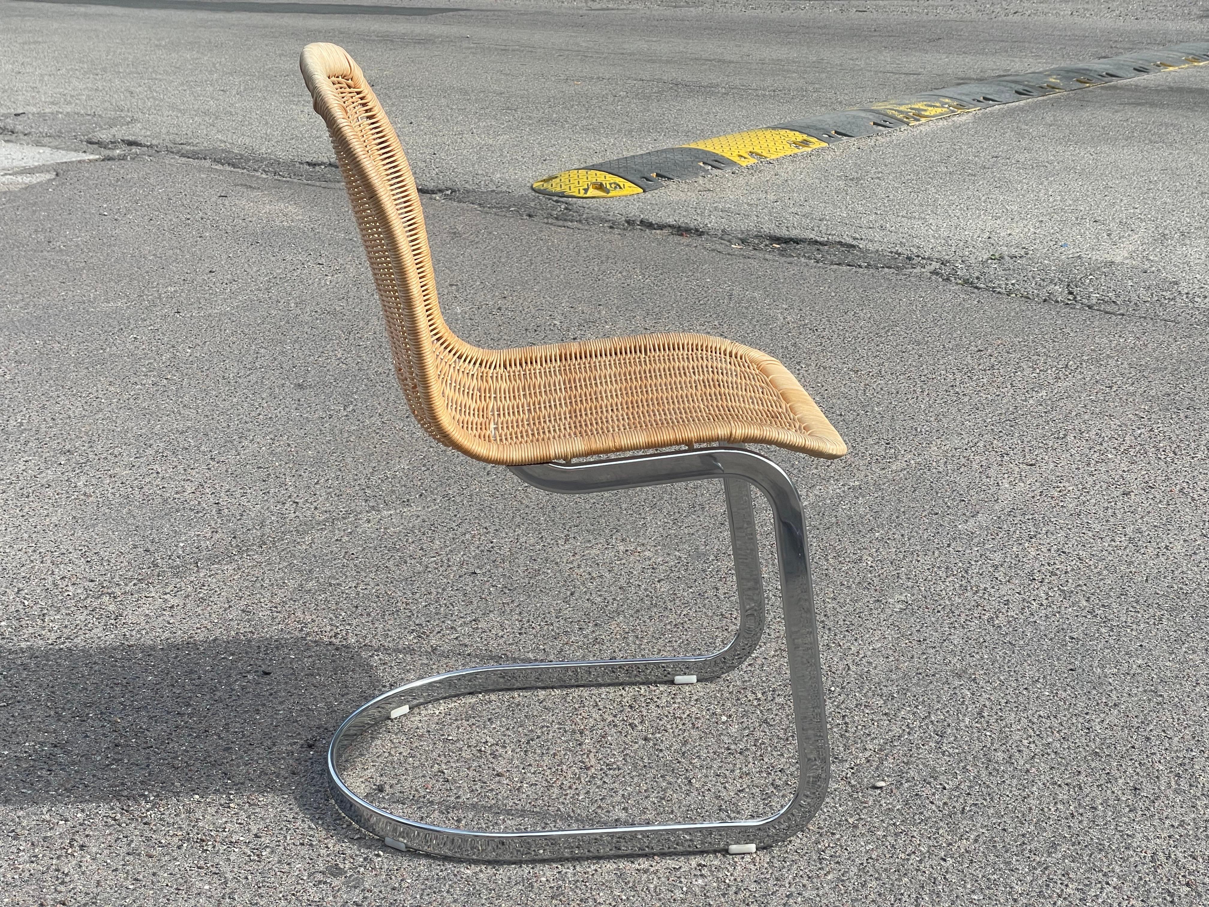 Italian 1970´s Cidue dinning chairs with chrome structure and wicker seating. 2