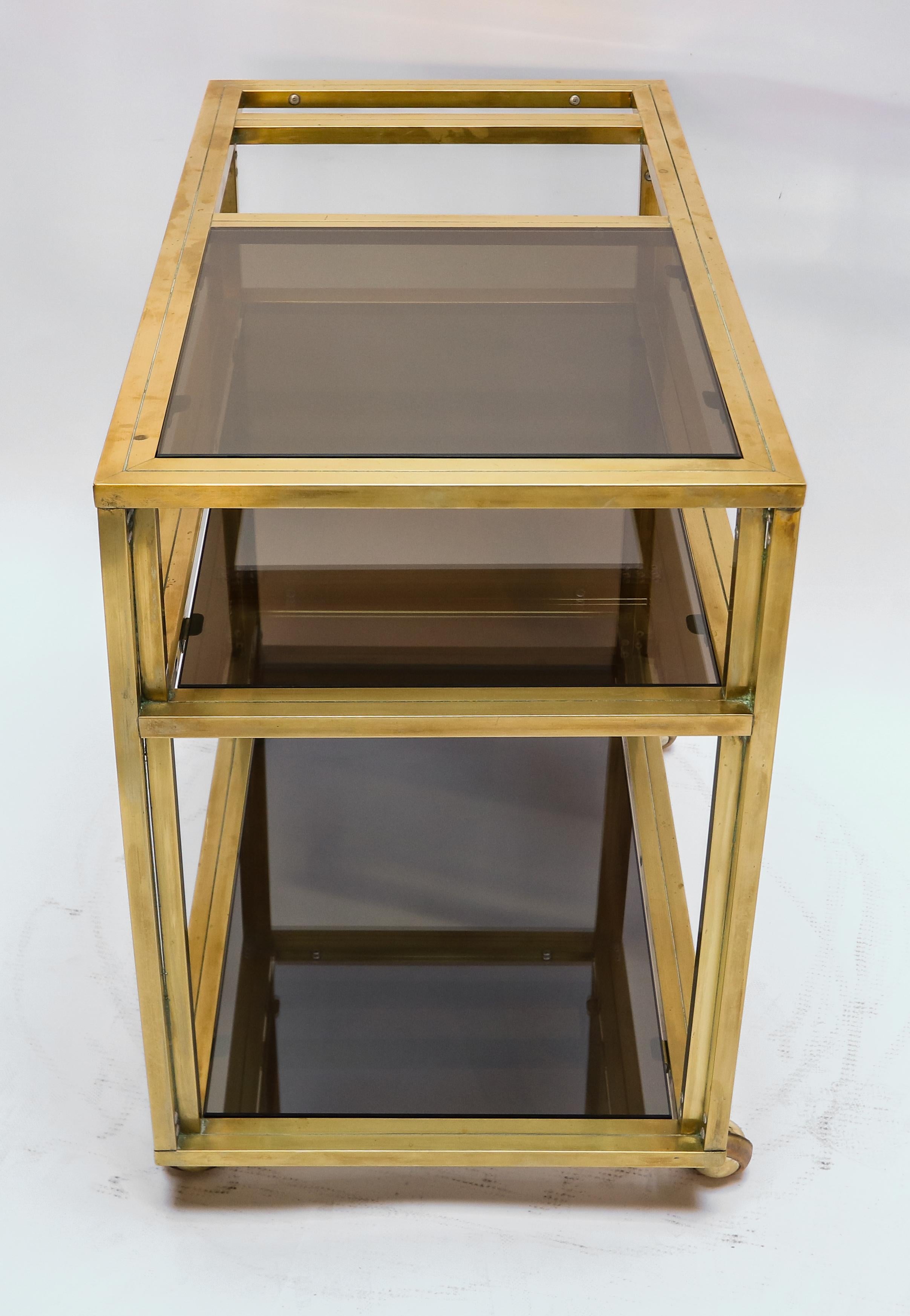 Late 20th Century Italian 1970s Brass Bar Cart with Three Smoked Glass Shelves For Sale