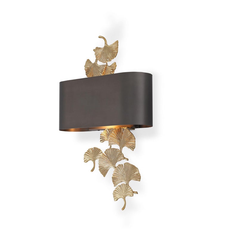 Italian 1970s design style and organic look wall light with brass leaf and bronze steel shade. Elegant, presence and class. New item, never used.