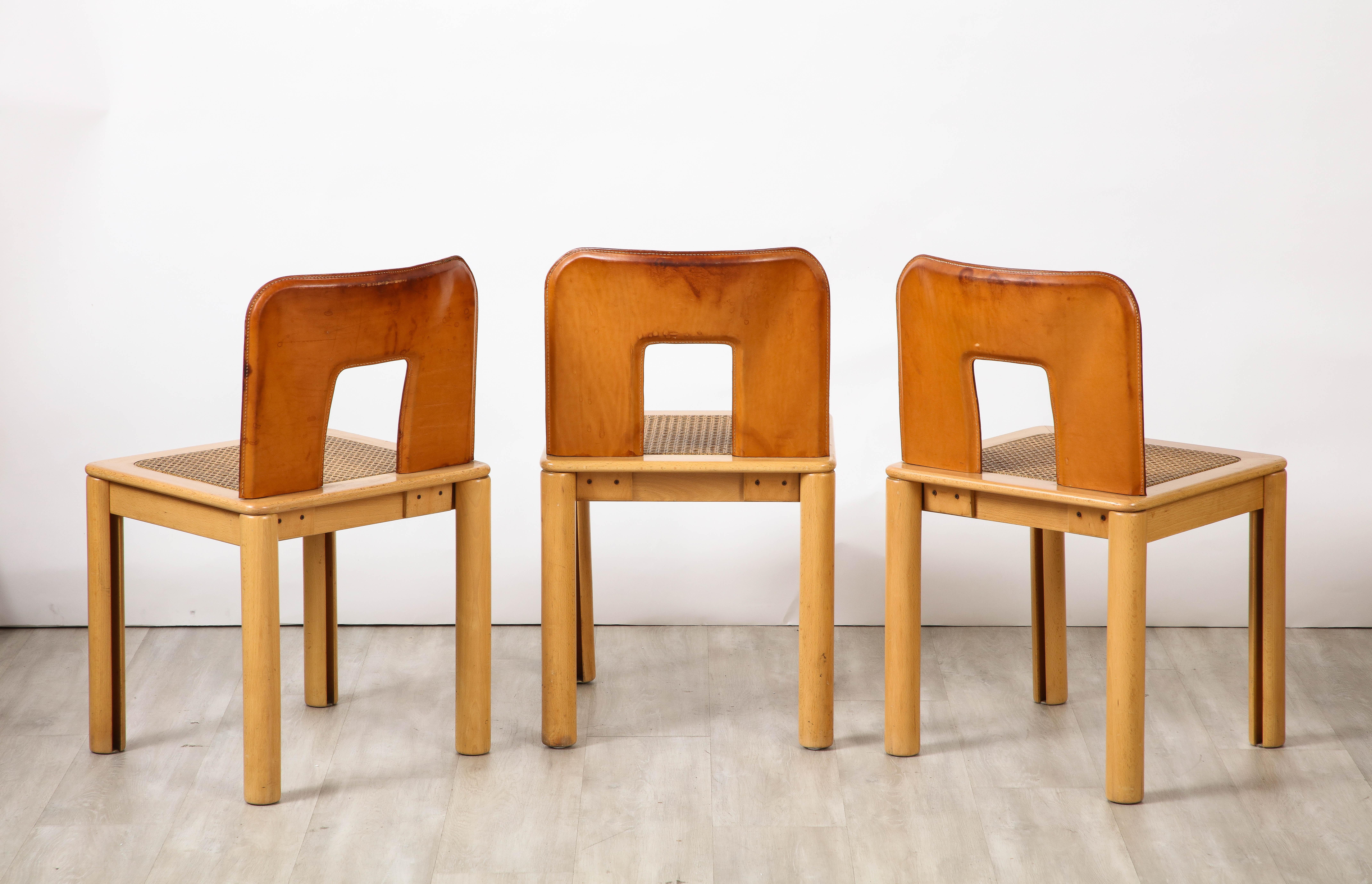 Italian 1970's Dining Chairs with Leather, Wood, Cane Seats, Italy, circa 1970 For Sale 5