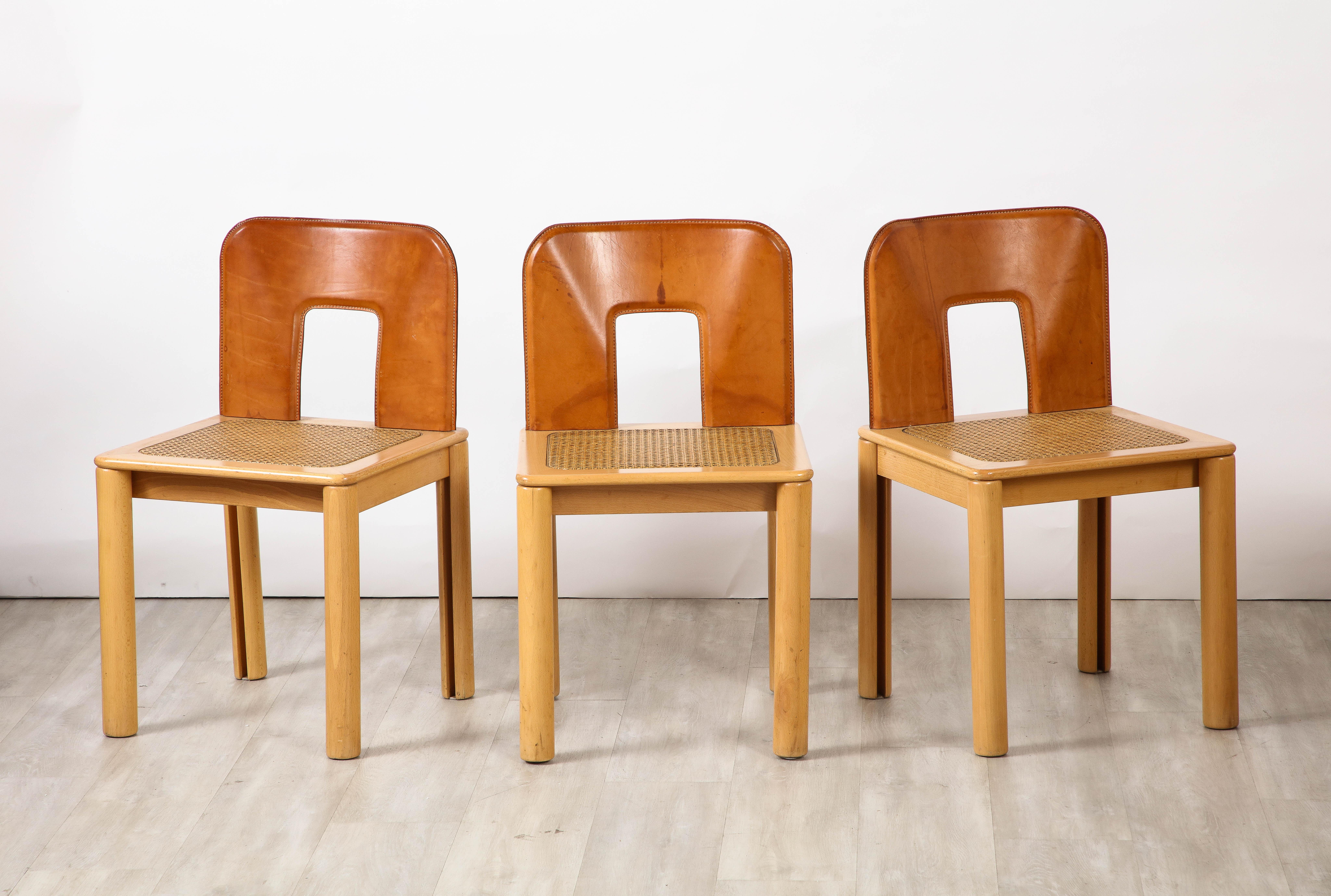 Italian 1970's Dining Chairs with Leather, Wood, Cane Seats, Italy, circa 1970 For Sale 3