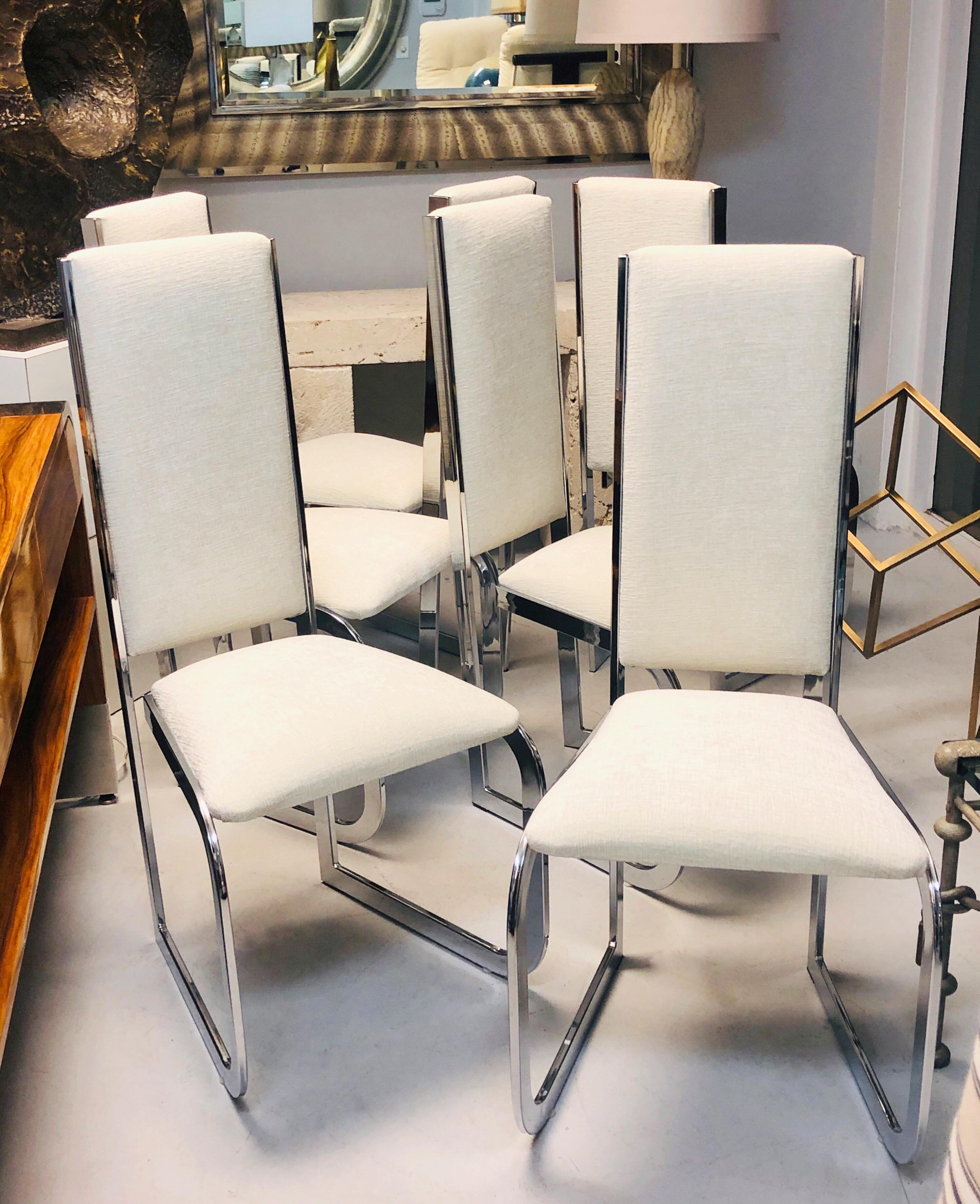 Super chic set of chairs. Simple frames, with cantilevered seats. Note how the frames are wider at the front echoing the shape of the trapezoidal seat.