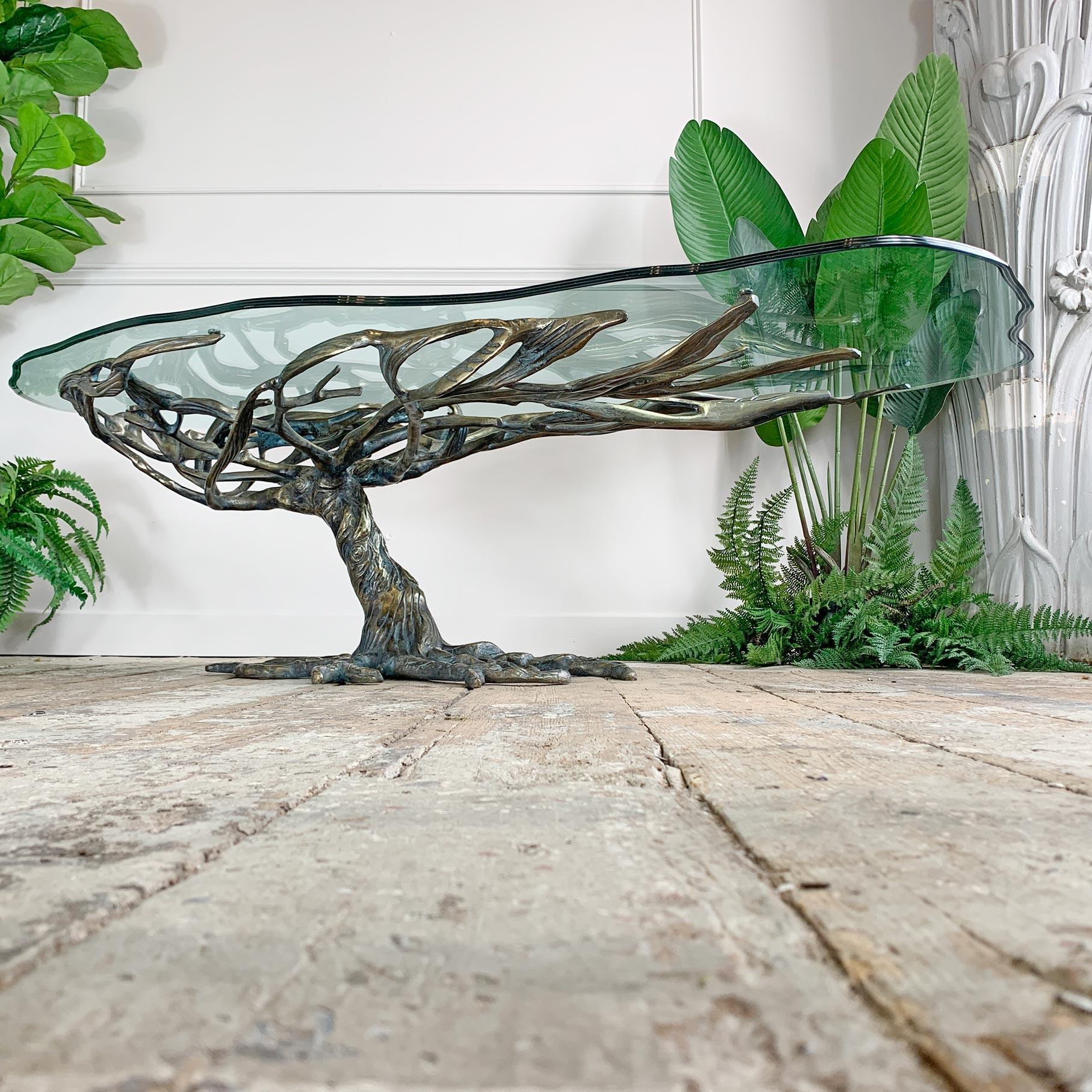 A sensational large bronze coffee table, in the form of a tree, hand crafted in Italy in the 1970’s, the detailing on this piece is astounding, the knotted bark of the trunk twists upward into long entwined branches, each with superb detail, these