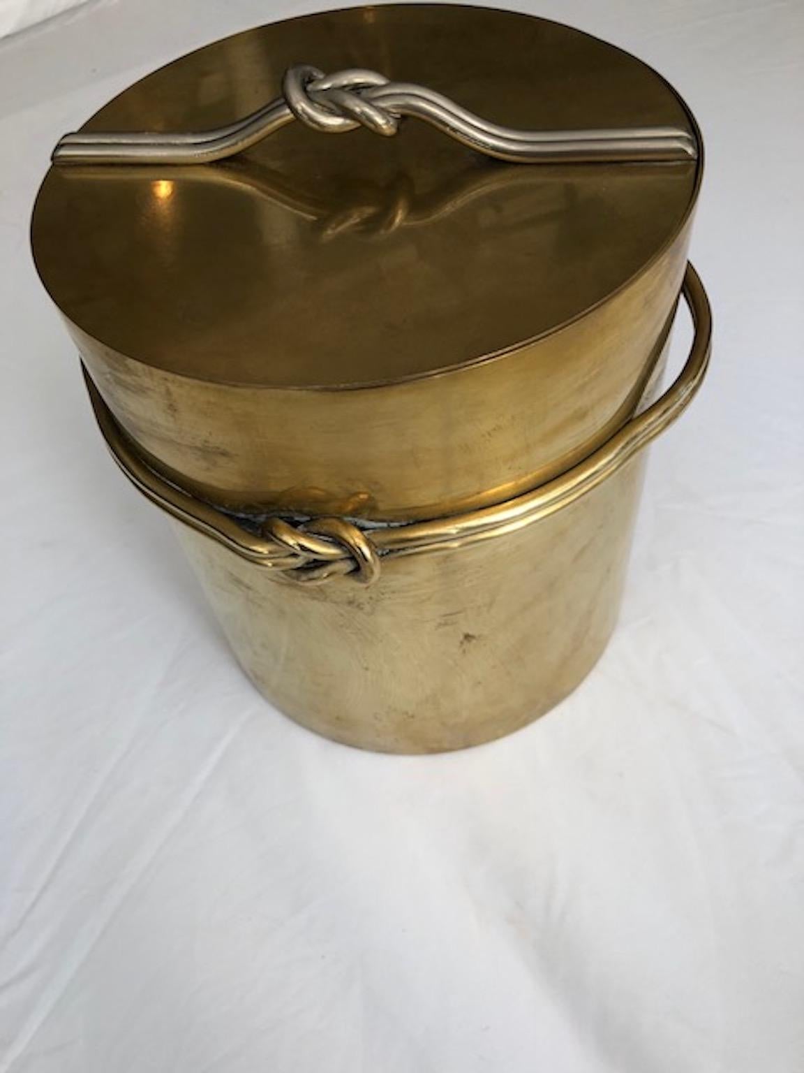Vintage ice bucket with a twisted rope design on the lid and around a container, made of brass, and inside fine polished steel, Italian, 1970s.