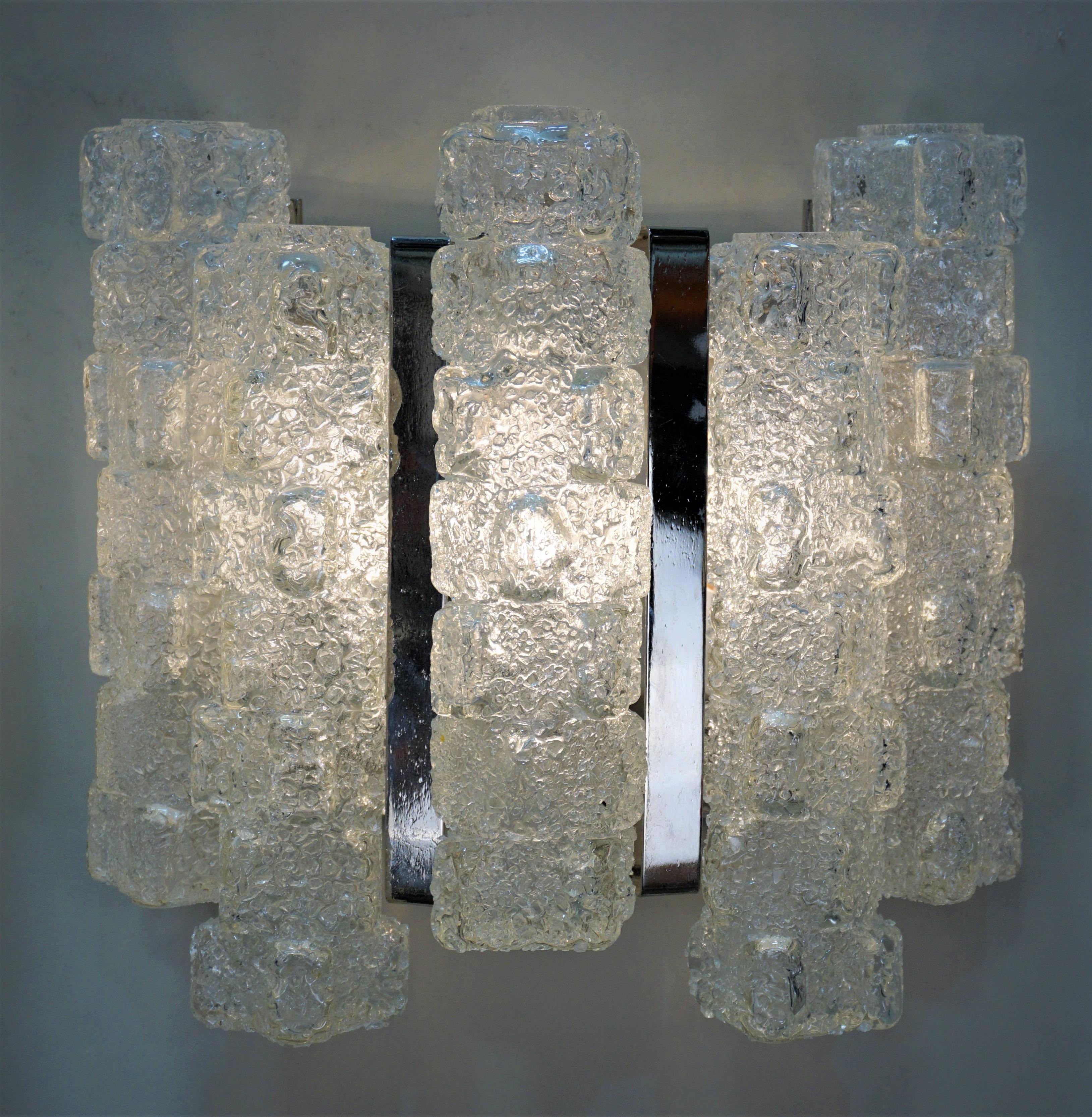Pair of Italian 1970s ice cube glass and nickel wall sconces
4 lights 60 watt each.