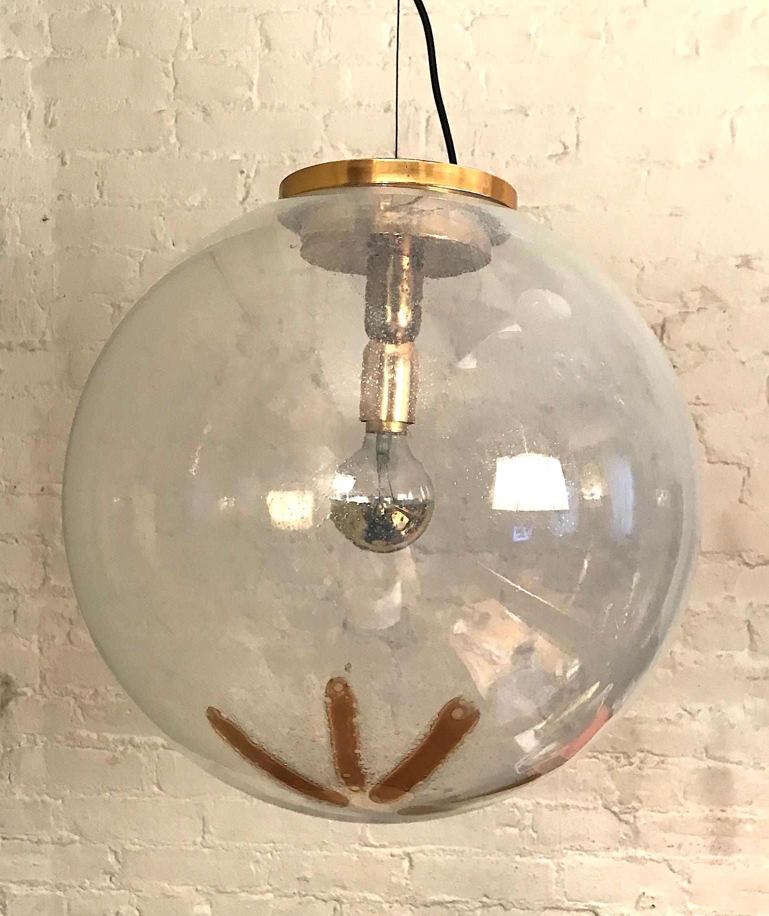 Italian large 17 inch diameter statement glass globe pendant light, circa 1970. The globe is hand blown glass with many tiny bubbles. This method is known as 