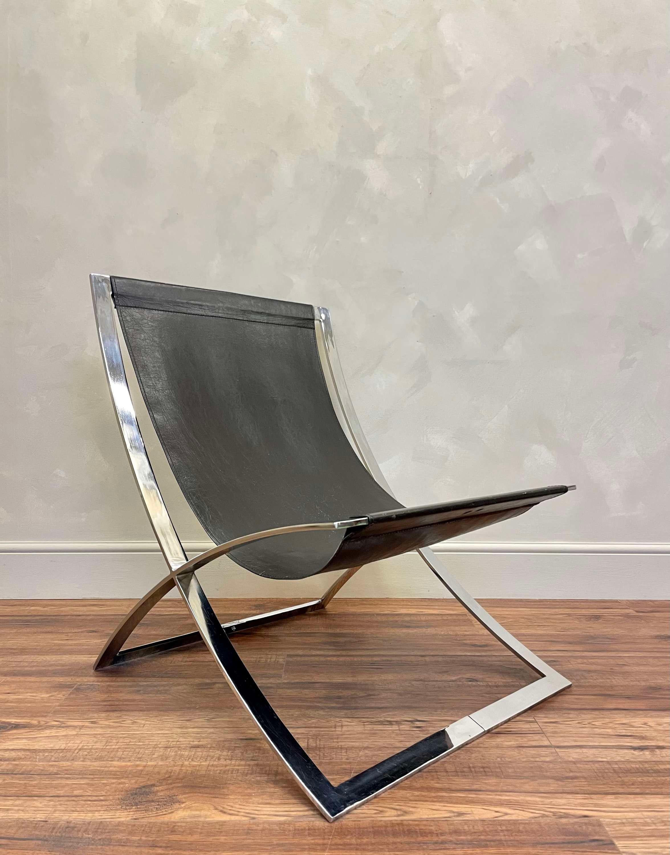 Leather and chrome scissor chair attributed to Italian Marcello Cuneo c1970.
Very stylish and in great condition.

Back height - 86 cm / 33.8