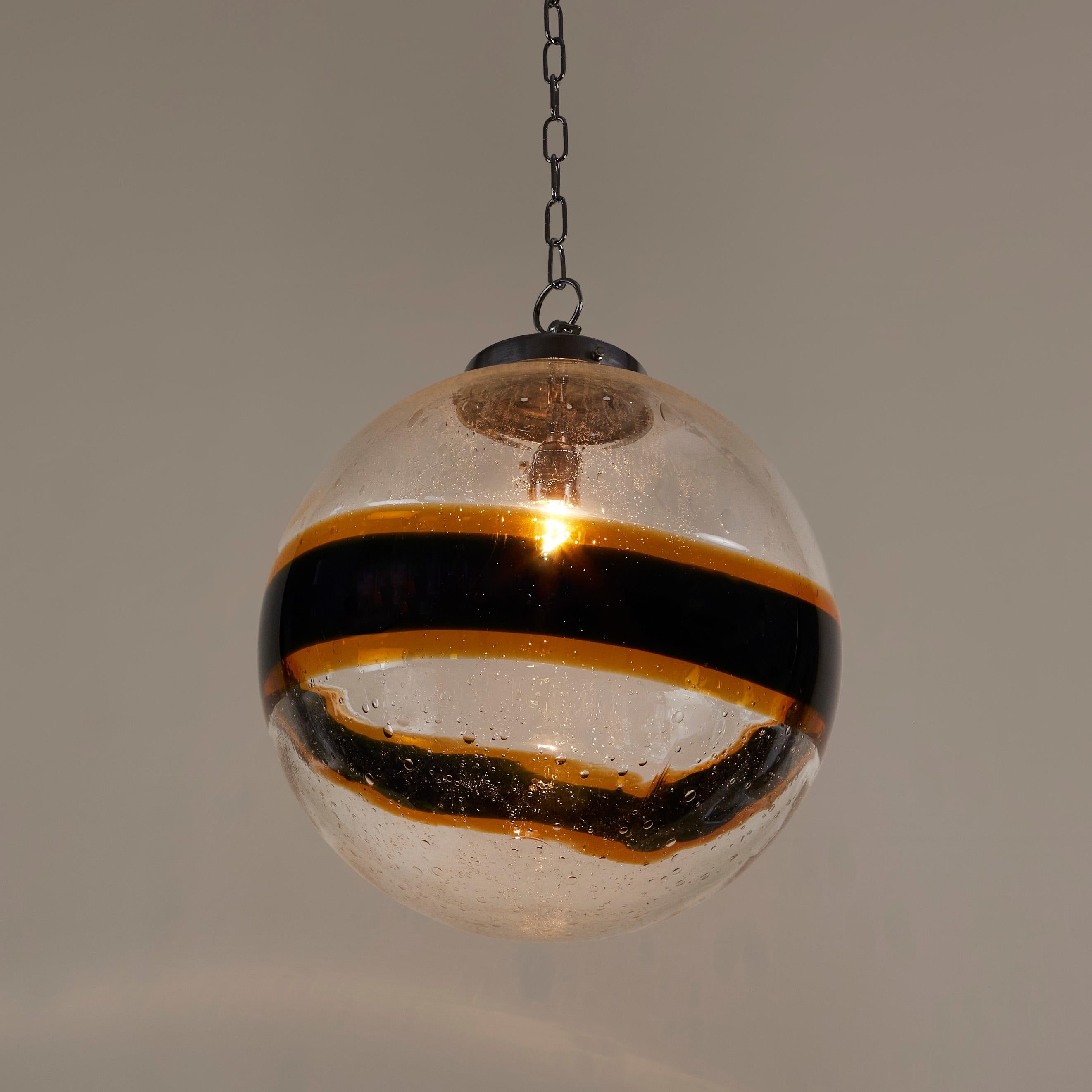 Murano Glass Italian 1970s Murano black and gold swirl ball pendant For Sale