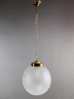 Italian 1970s Murano hand-blown glass and gilded metal frame pendant lamp.