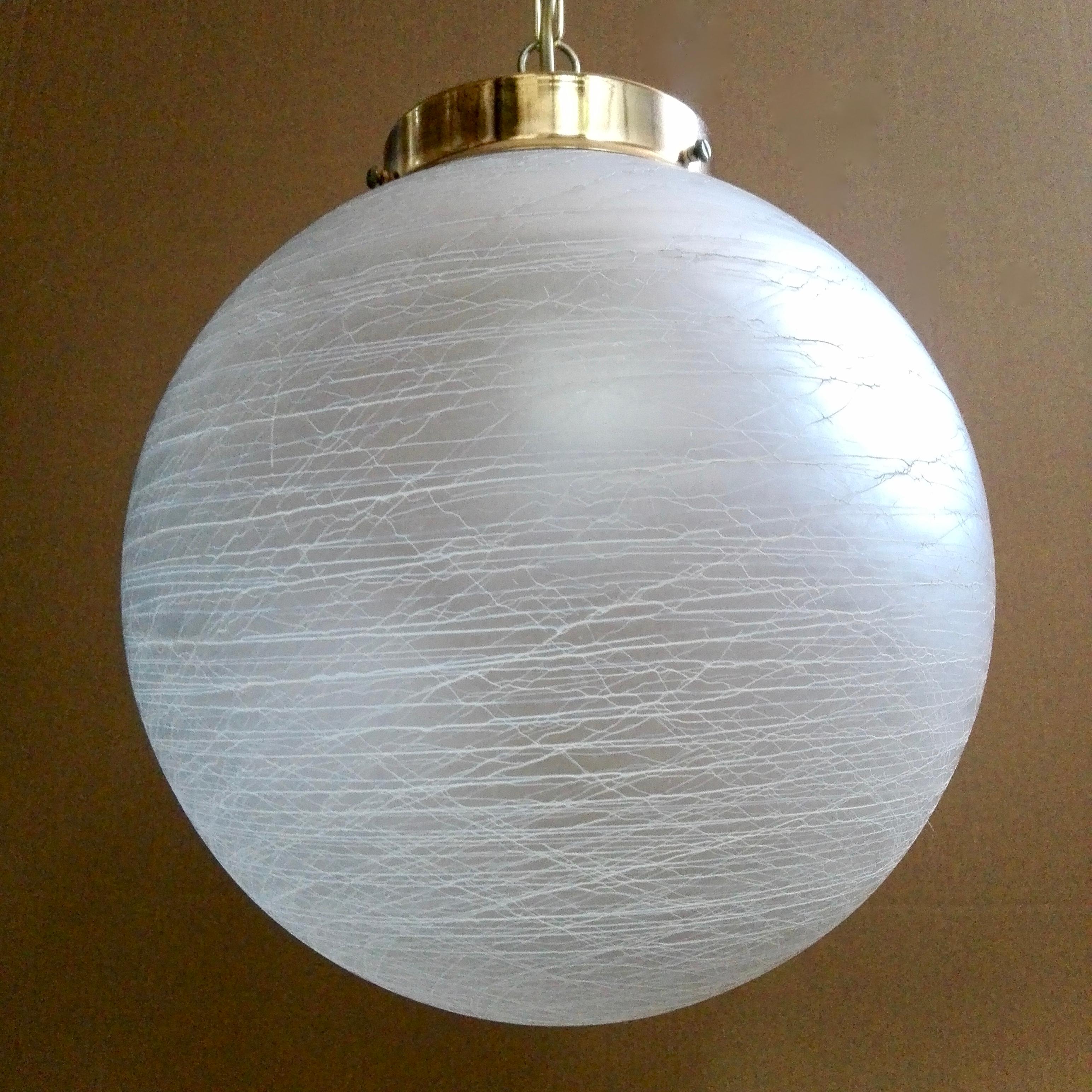 Hand-Crafted Italian 1970s Murano hand-blown glass and gilded metal frame pendant lamp. For Sale