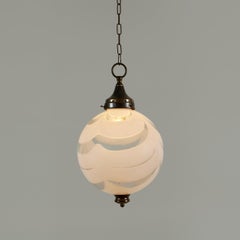 Italian 1970s Murano white swirl ball pendant with decorative brass fixtures