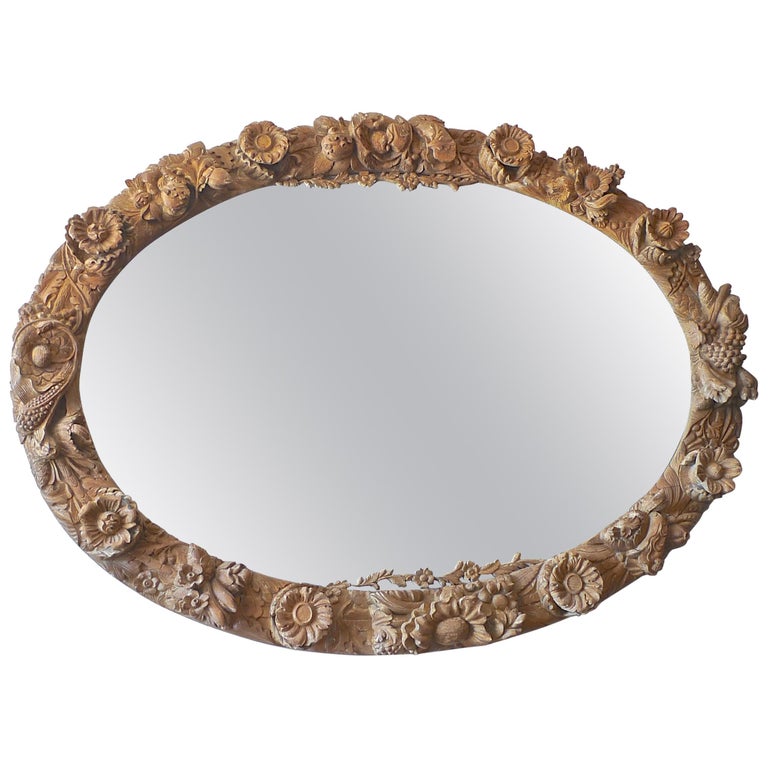Italian 1970s Oversized Hand Carved Oval Wood Mirror Frame With Aged Italian 1970s Oversized Hand Carved Oval Wood Mirror Frame With Aged Glass For