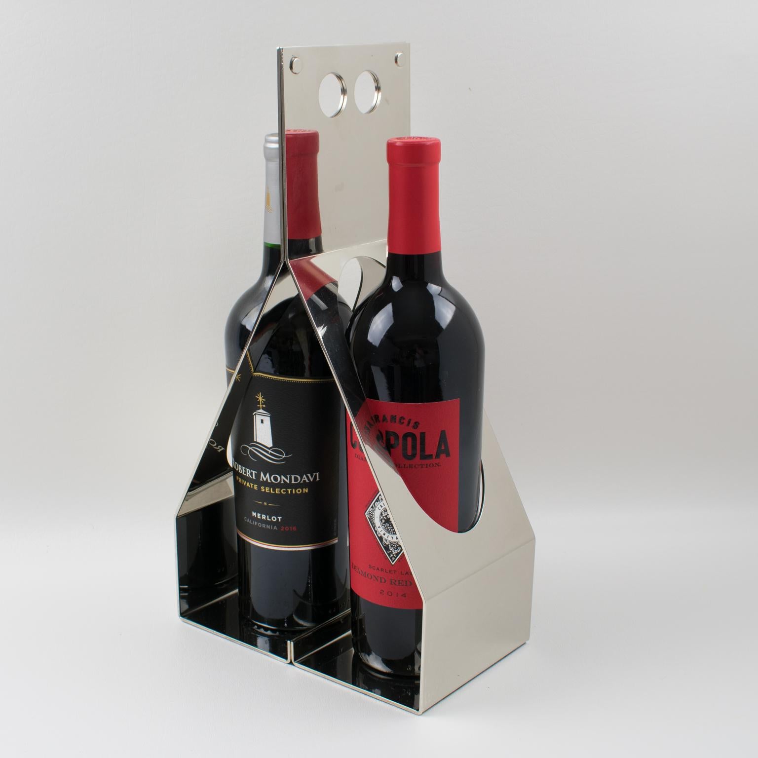 Stylish Italian 1970s modernist silver plate wine bottle caddy or carrier. This ultra-chic bottle holder features a streamlined Minimalist design with compartment holders perfect for accommodating two Bordeaux wine bottles. Lots of character, bold