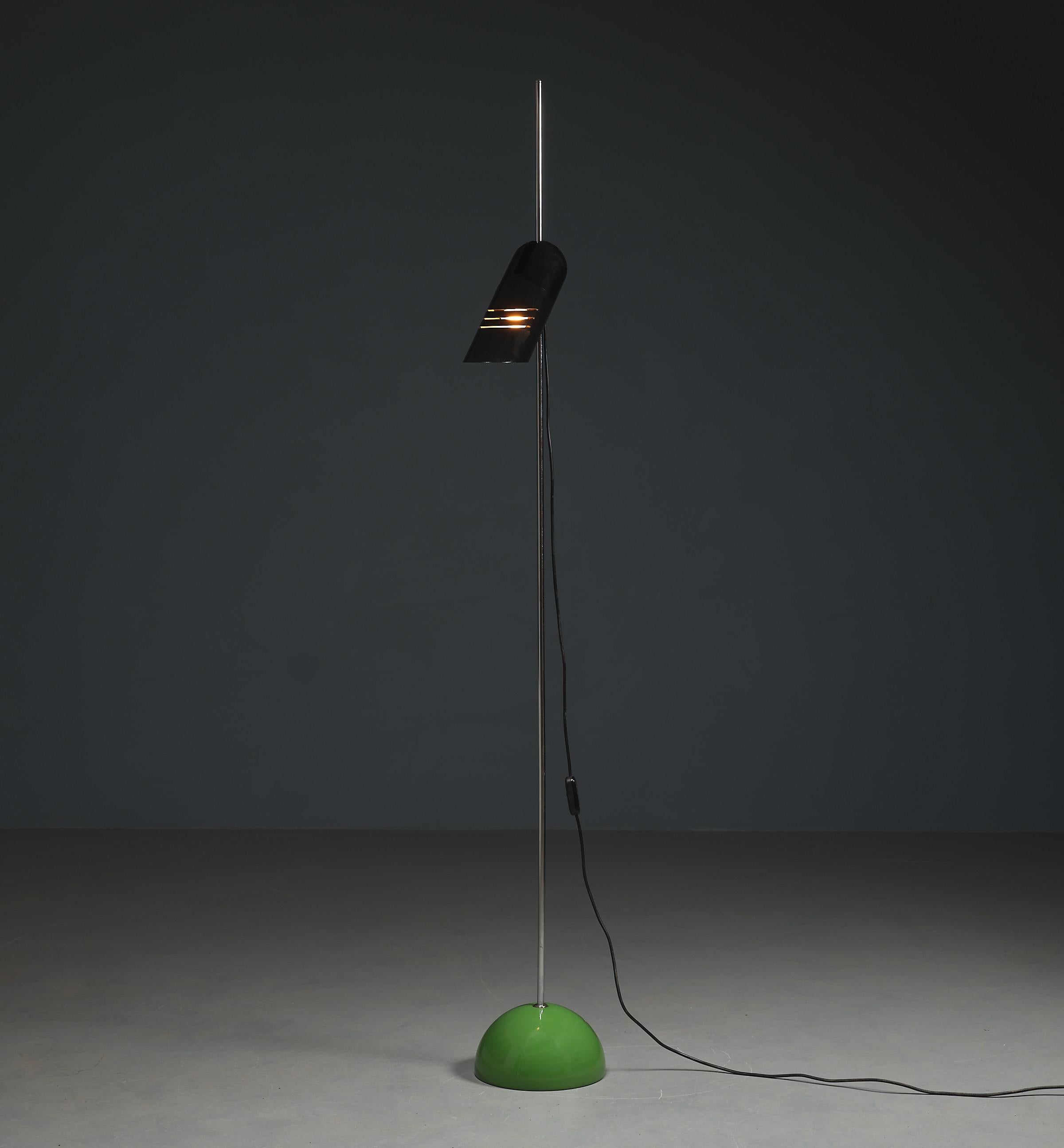 This striking 1970s floor lamp, with its modern Italian design, embodies the essence of vintage midcentury aesthetics. Crafted from a blend of chrome-plated steel, green lacquered steel, black lacquered aluminum, and polystyrene, it stands as an