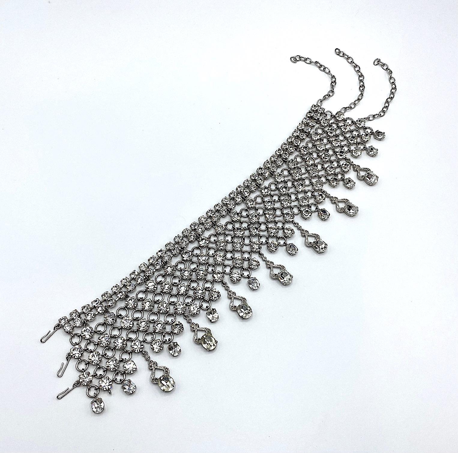 A true dog collar style necklace by Italian fashion jewelry company Bozart. The Milan based company has been producing bijoux, bags and fshion accessories since opening in 1956. This necklace is chocker style meant to be worn closely around the neck