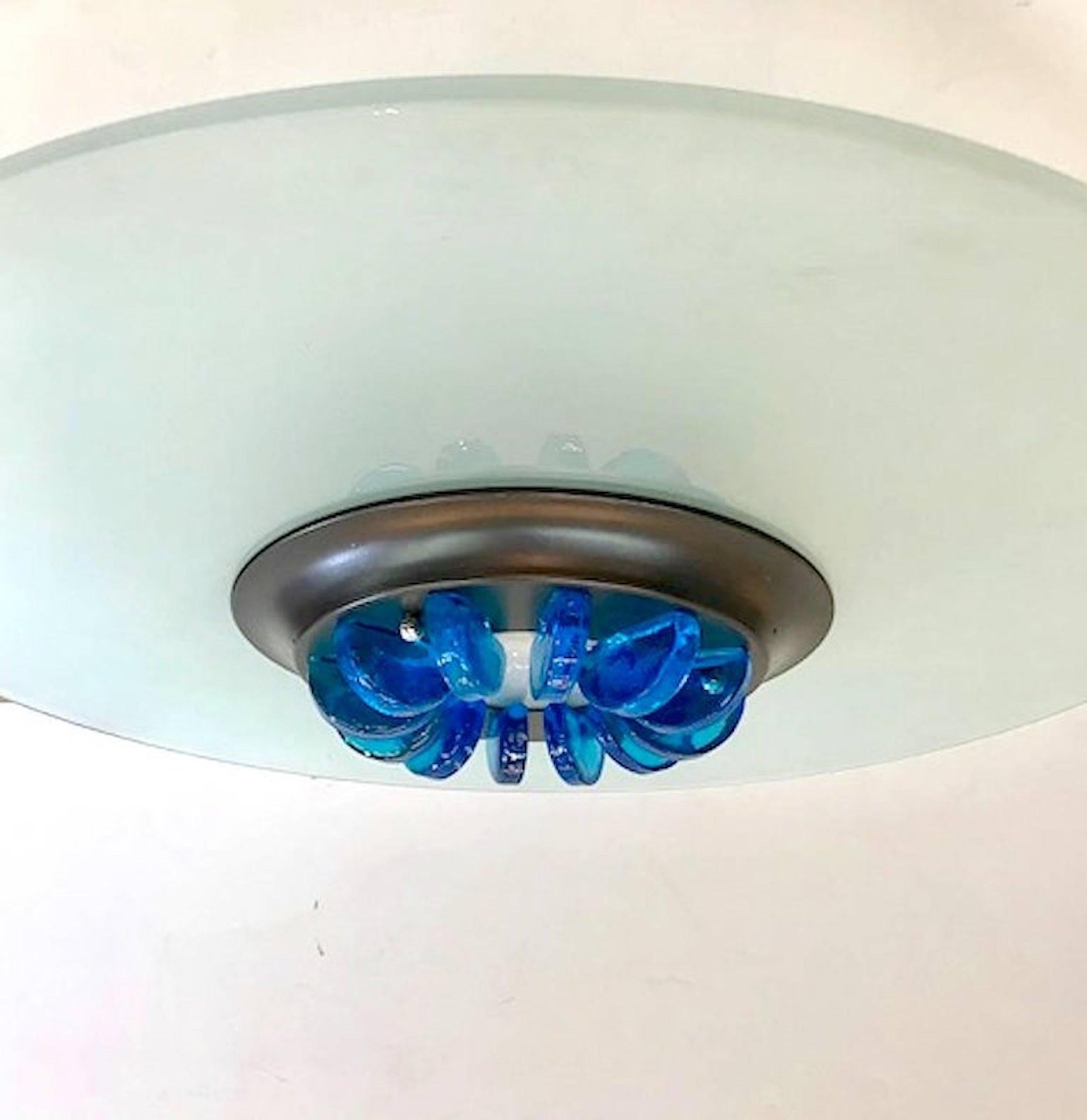 An Italian 1980s Italian ceiling mount light in the Memphis style.
24