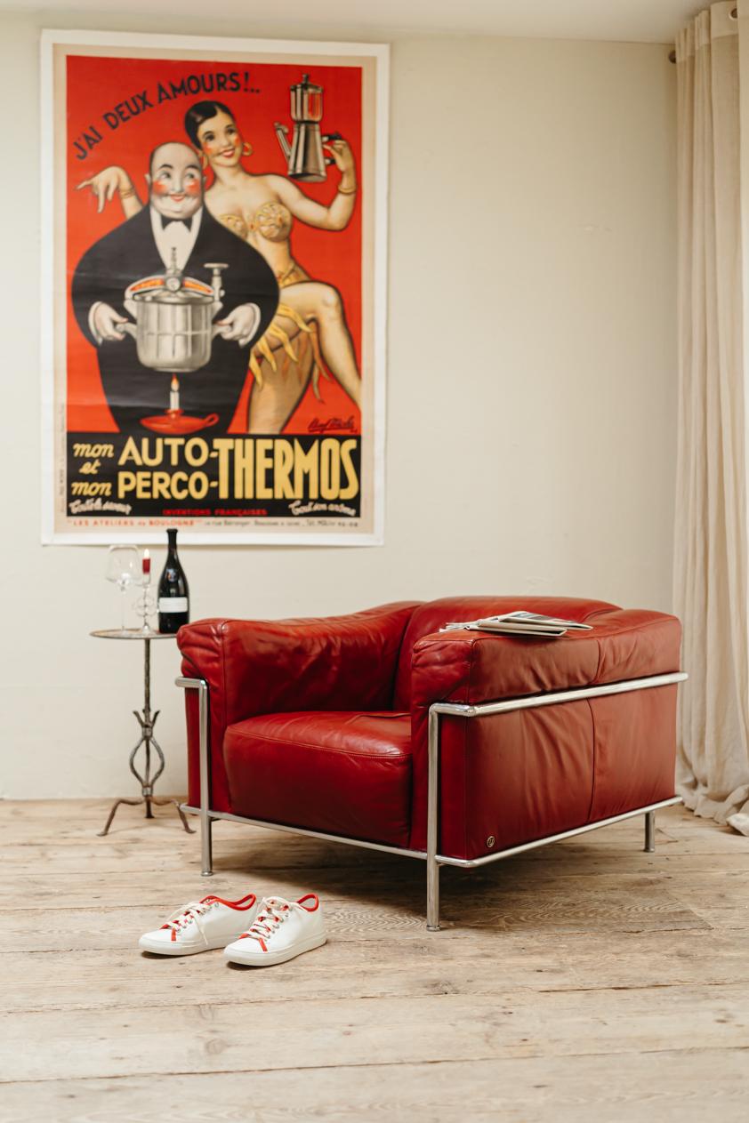 Italian chrome and red leather lounge chair, Natuzzi 3