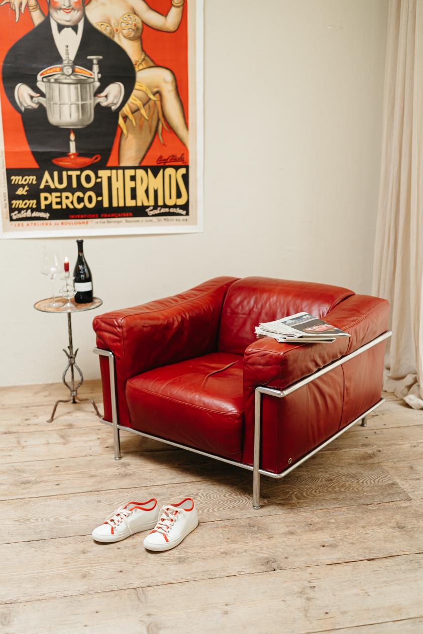 Italian chrome and red leather lounge chair, Natuzzi 4