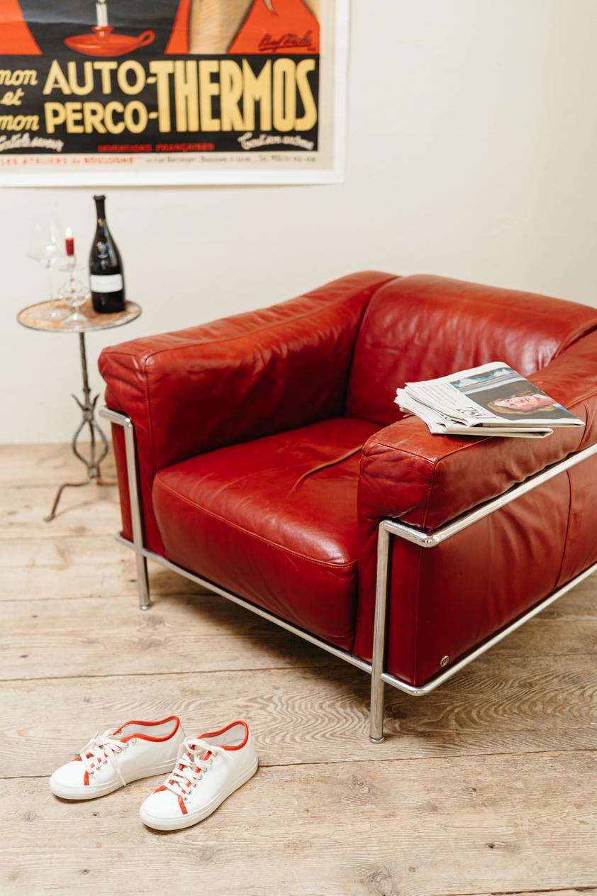 Italian chrome and red leather lounge chair, Natuzzi 6