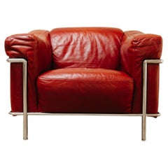 Fauteuil de salon italien en chrome et cuir rouge, Natuzzi