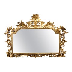 Specchio italiano del XIX-XX secolo in stile rococò fiorentino con cornice in legno dorato e intagliato