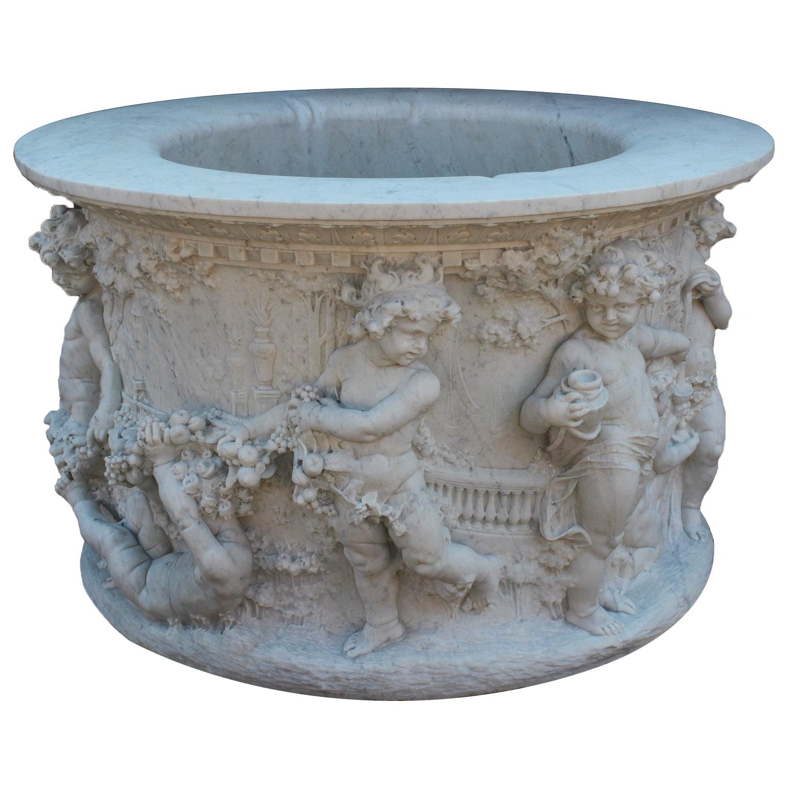 Hand-Carved Italian 19th-20th Century Whimsical White Marble Wishing Wellhead with Children For Sale