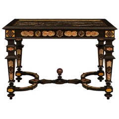 A.I.C.. Table centrale baroque en bois fruitier ébénisé et marbre Portoro