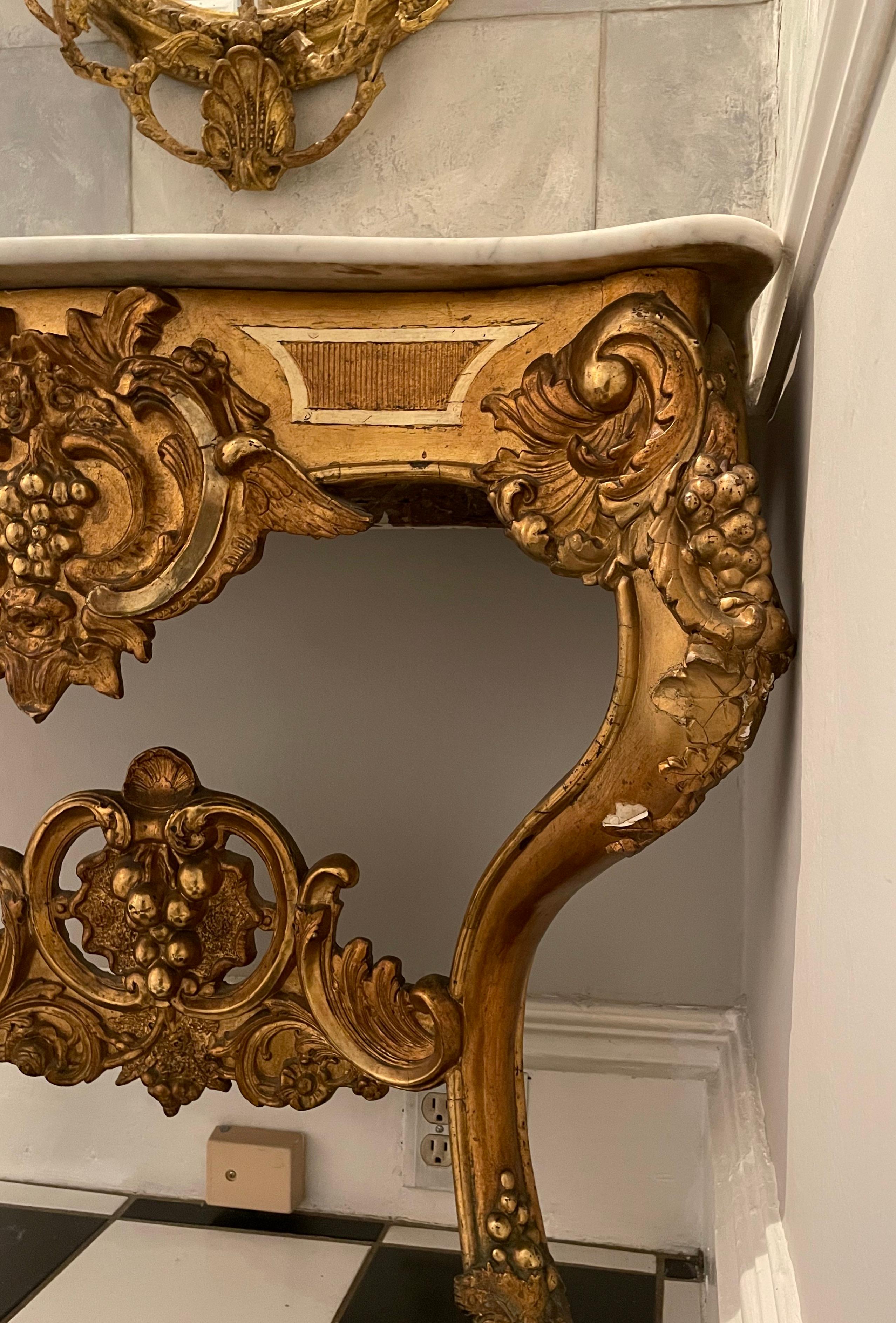 Hand-Carved Italian 19th C Curved Console Table with Triple Gilding and White Marble Top For Sale