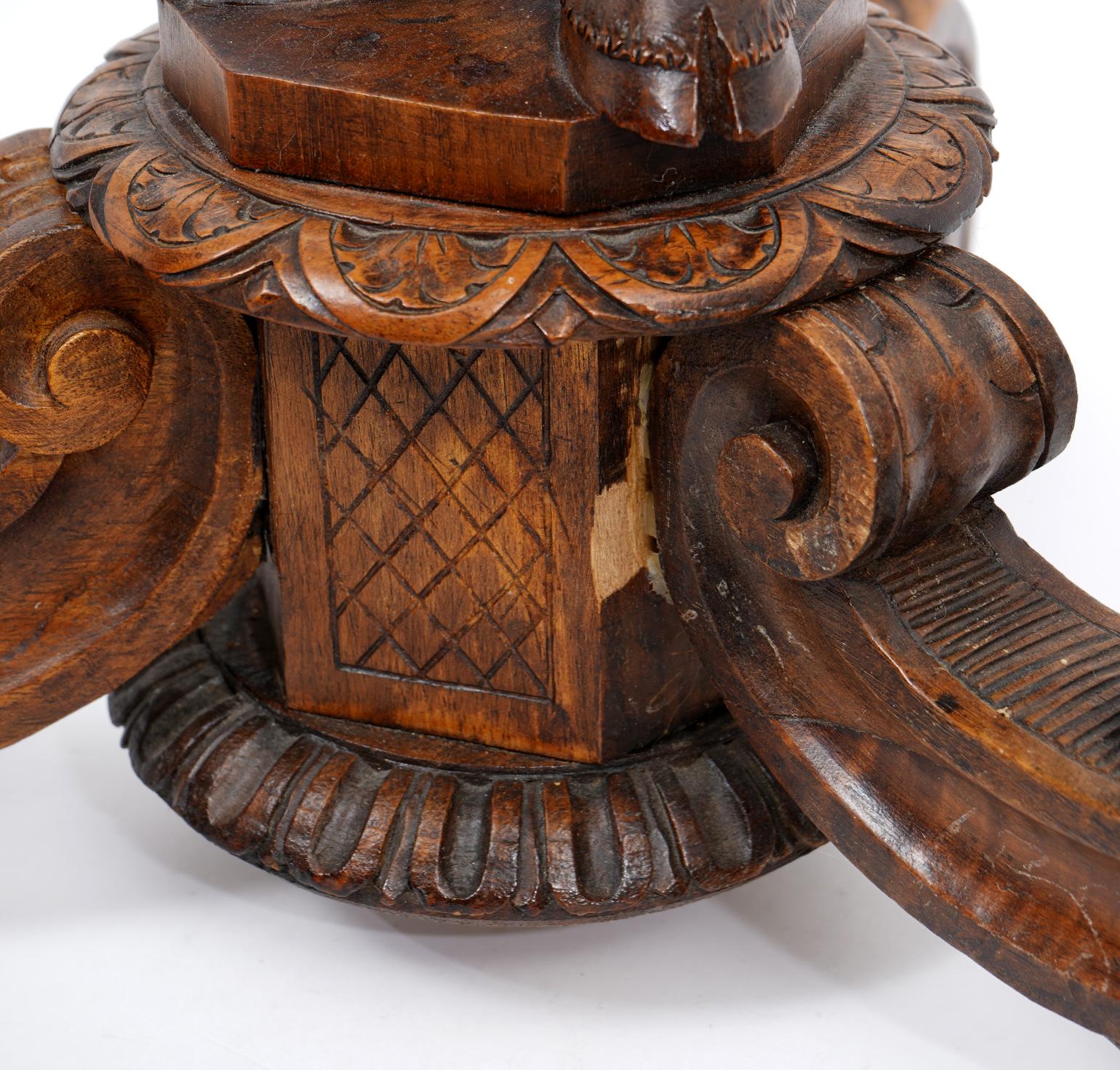Italian 19th C. Richly Carved Walnut Round Table Supported by a Young Satyr 6