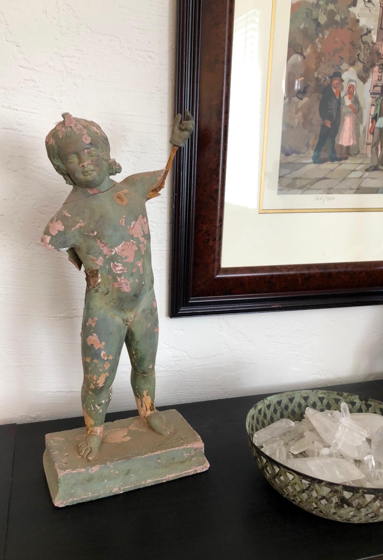19th century Italian putti on Base. Very damaged but beautiful as an antique decorative fragment. Made of Terracotta.