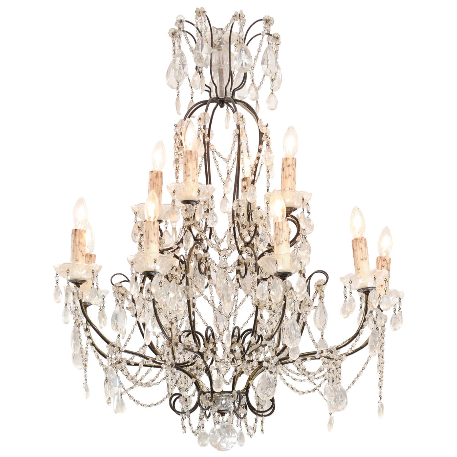 Italian 19th Century 10-Light Crystal and Iron Chandelier with Scrolling Arms For Sale