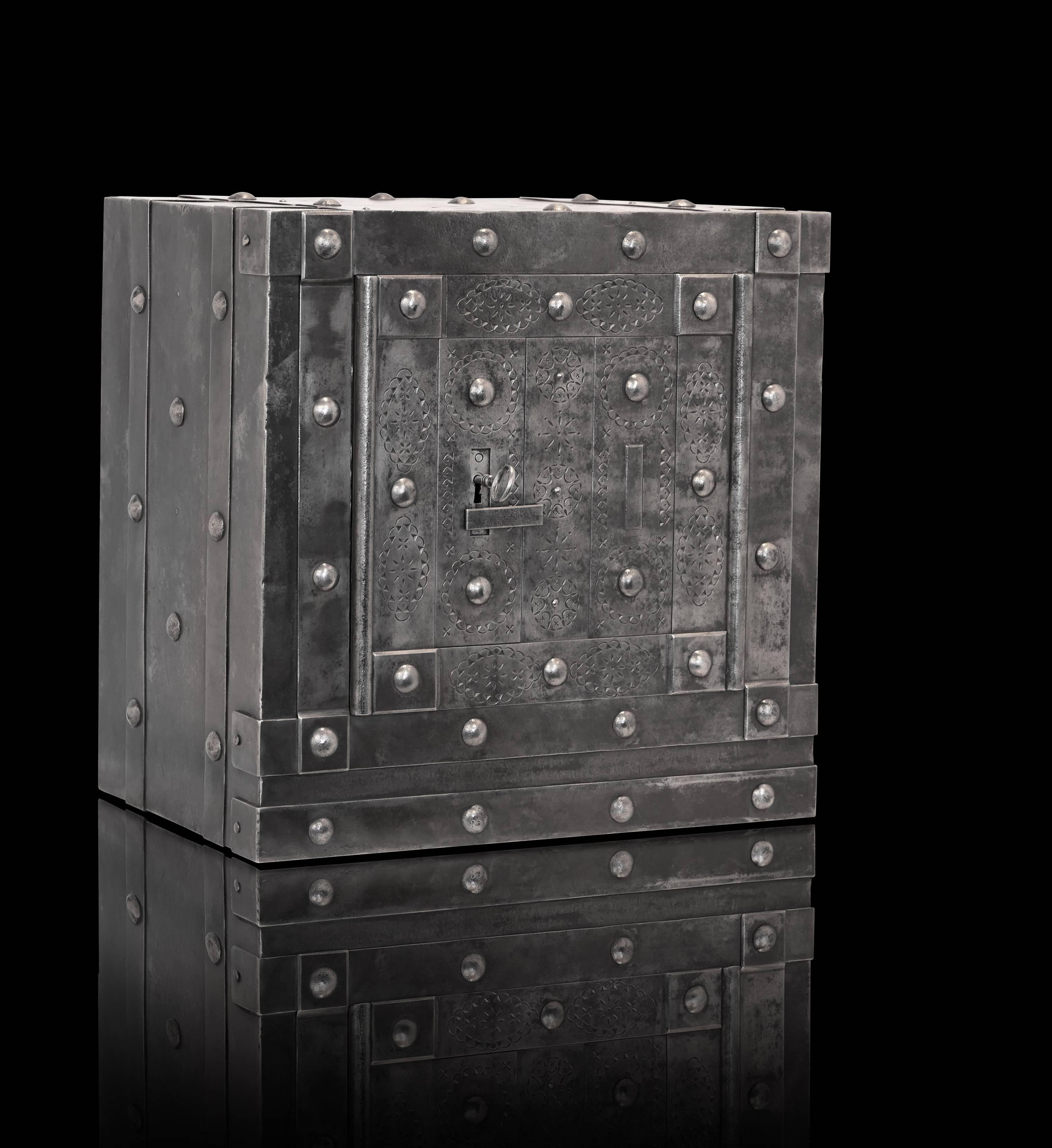 Small hobnail safe, desk top size, circa 1840. This safe has an original and working key lock door, with a hidden release to expose the key hole and a secret sequence to follow with the key to activate the double locking mechanism to open the