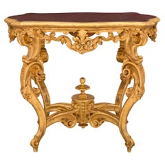 Table centrale baroque italienne du 19ème siècle en bois doré et faux porphyre peint