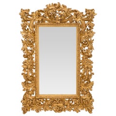 Miroir baroque italien du 19ème siècle en bois doré