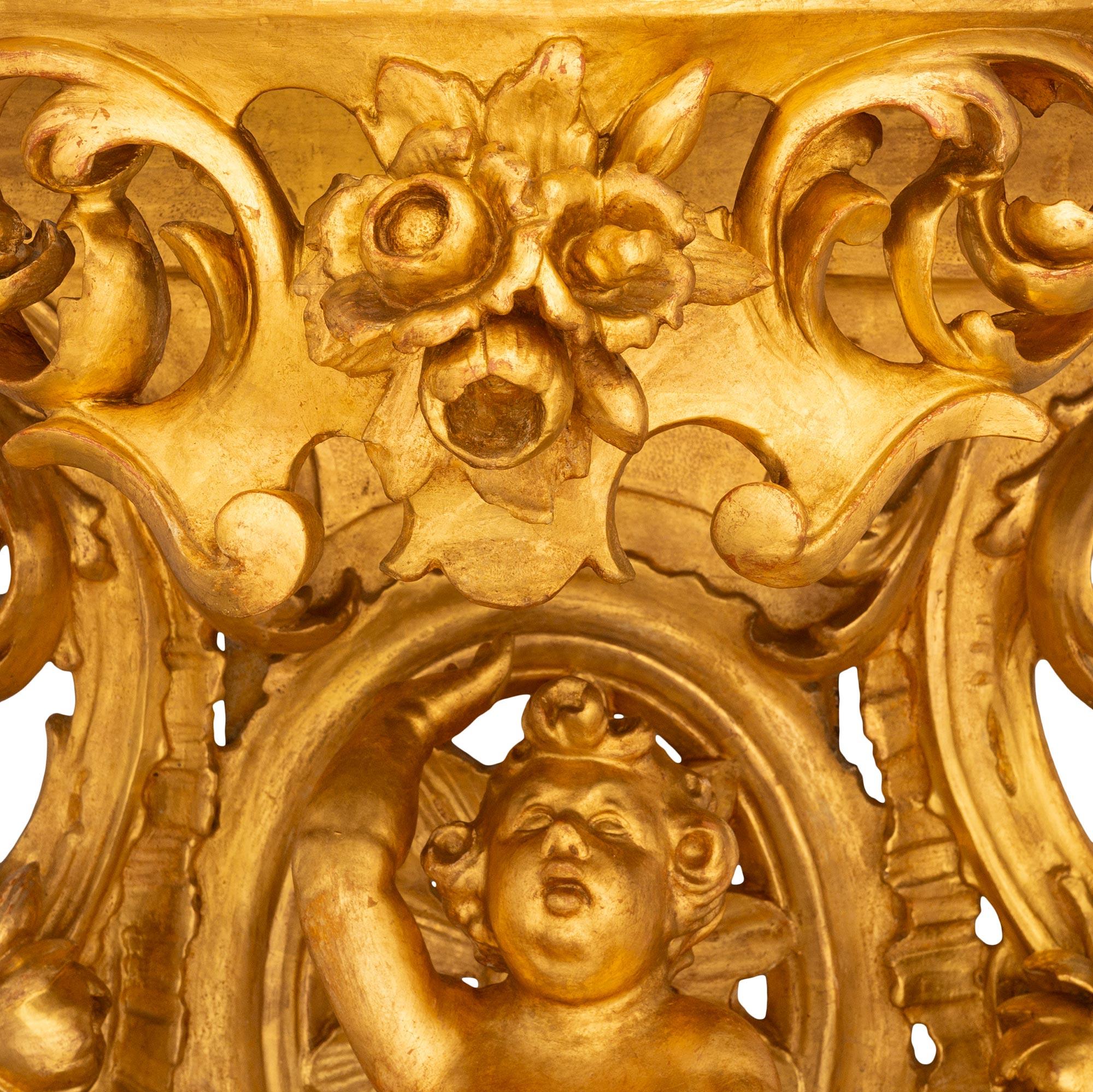 Consola italiana barroca del s. XIX de meca, madera dorada y mármol siglo XIX en venta