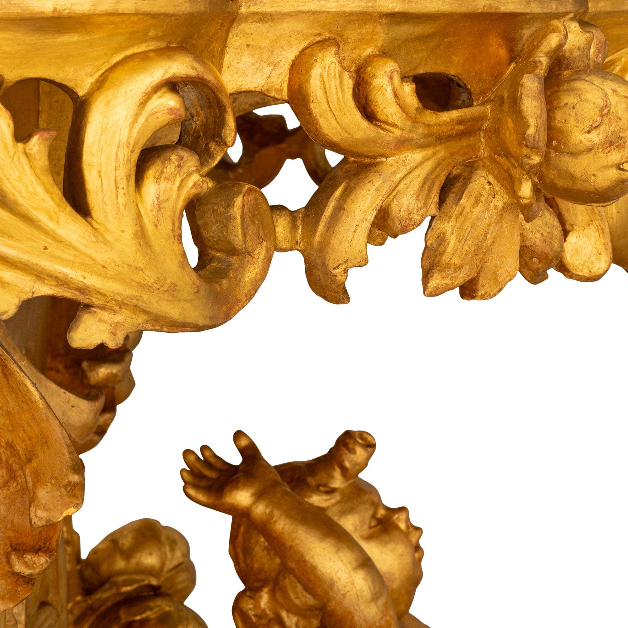 Consola italiana barroca del s. XIX de meca, madera dorada y mármol Mármol en venta