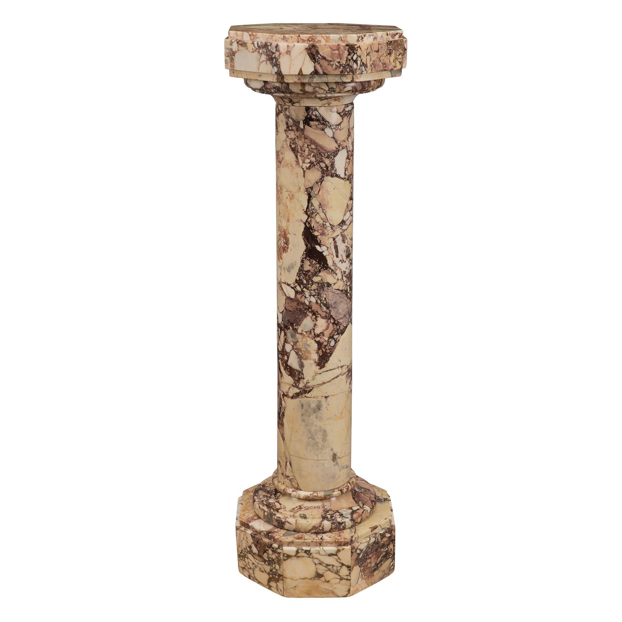 A fine Italian 19th century Brèche Violet marble pedestal column. The pedestal is raised by an octagonal base with a stepped border below the circular mottled band and central support. Above is the same elegant and most decorative circular mottled