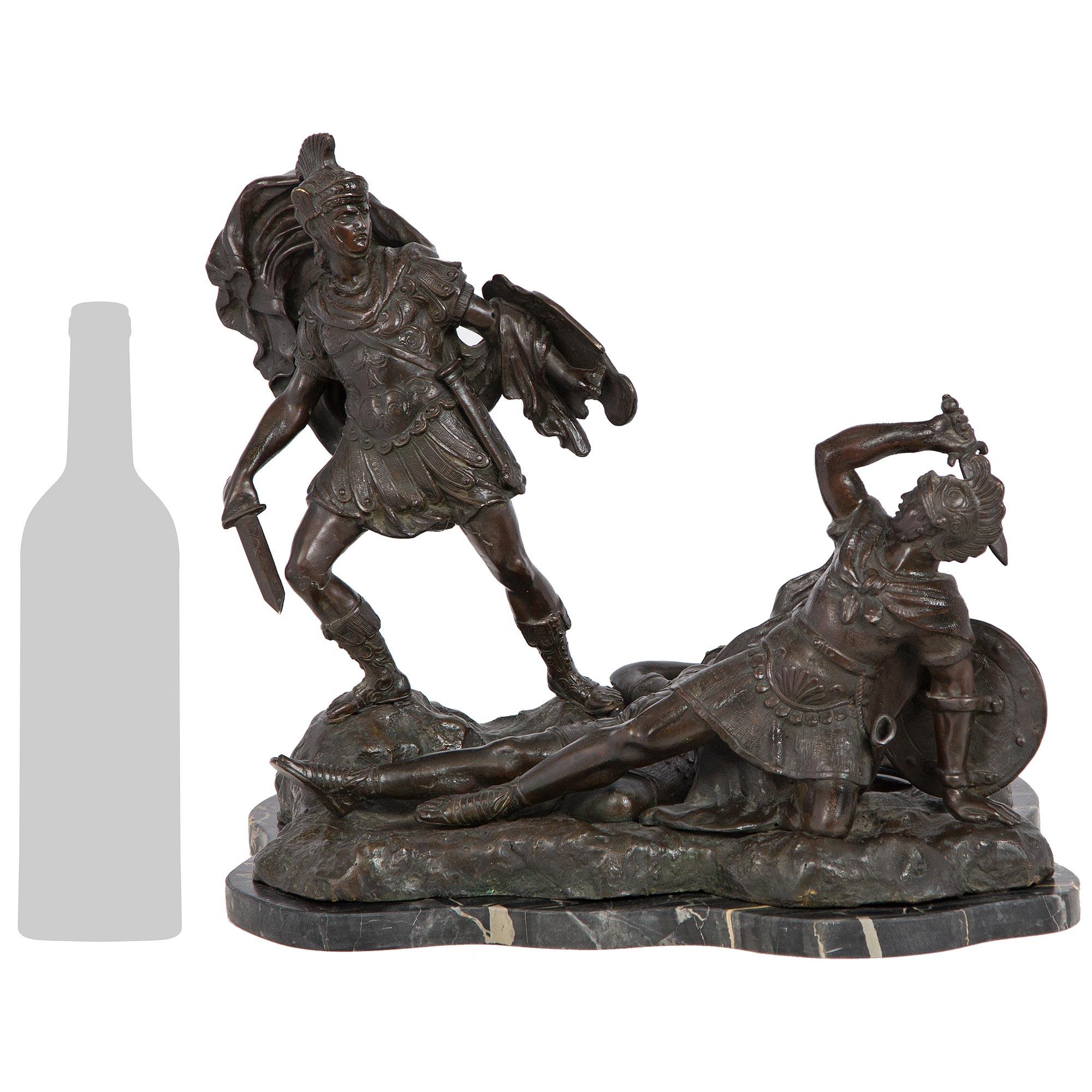 A handsome and high quality Italian 19th century Neo-Classical st. patinated Bronze and Portoro marble statue of Aeneas, Lausus, and Mezentius. This impressive statue is raised on a scalloped Portoro marble base mimicking the shape of the bronze