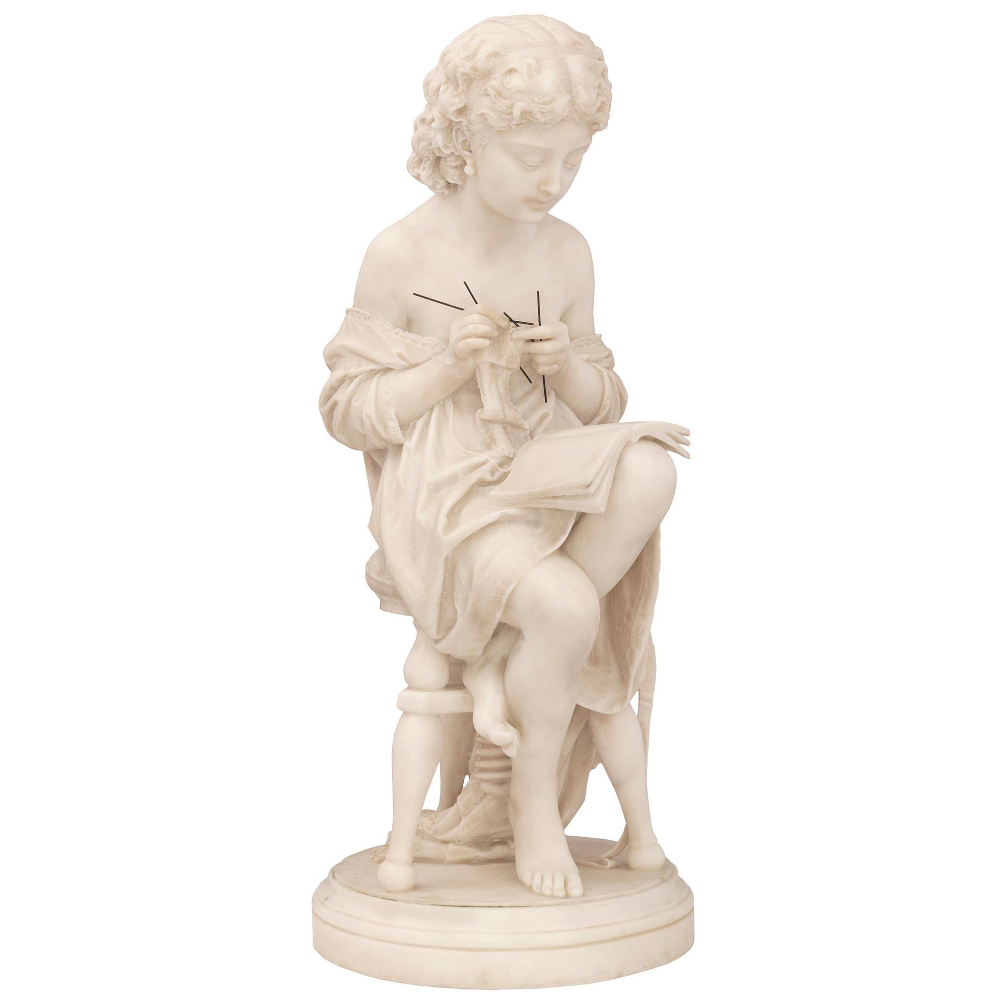 A sensational and extremely high quality Italian 19th century white Carrara marble statue of a young girl, signed UGO ZANNONI, MILANO 1882. The charming statue is raised by a circular mottled base. The beautiful young girl is sitting on a swivel