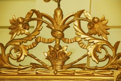 Italian 19th Century Carved and Gilded Mirror With Basket of Flowers