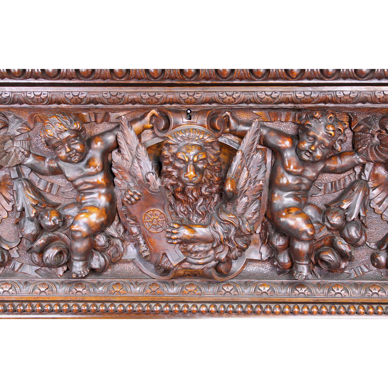 Italian 19th Century Carved Walnut Cassone Chest with Putti and Winged Dragons In Good Condition For Sale In Los Angeles, CA