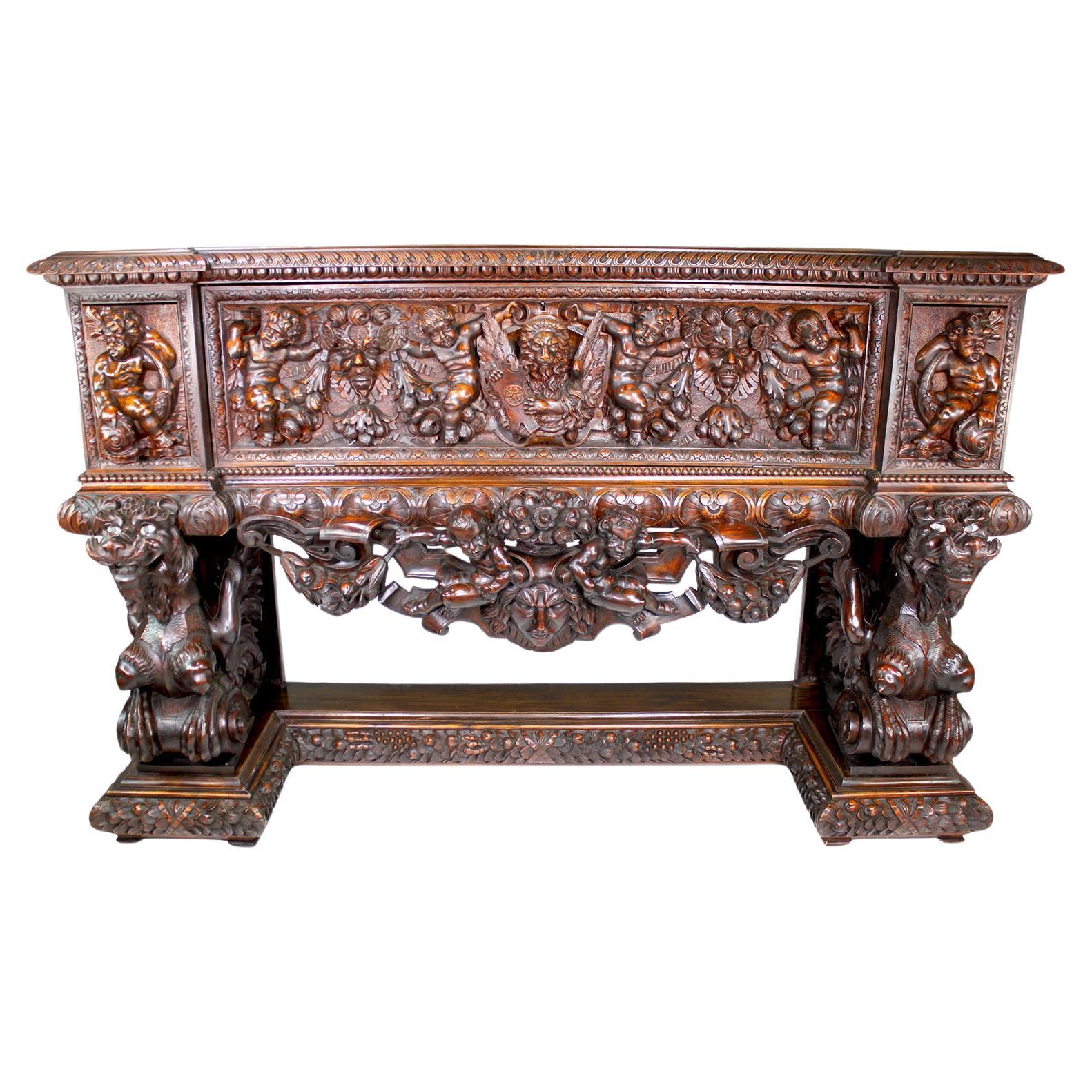 Italian 19th Century Carved Walnut Cassone Chest with Putti and Winged Dragons For Sale