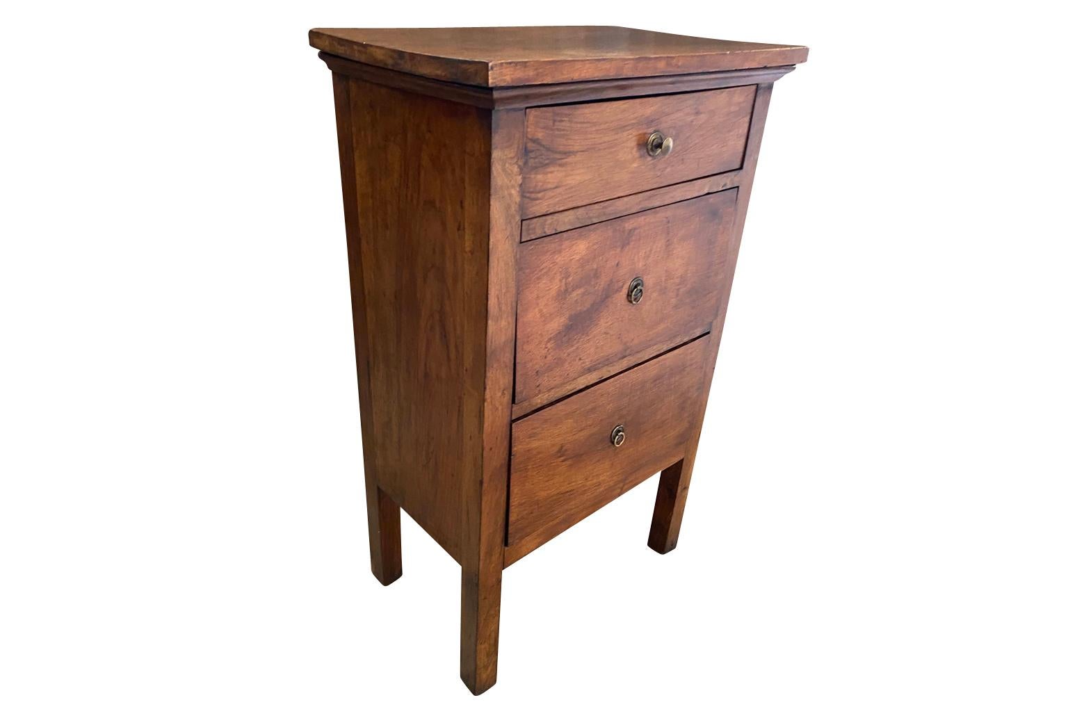 A charming later 19th century Commodini from the Lombardi region of Italy. Soundly constructed from walnut with three drawers.